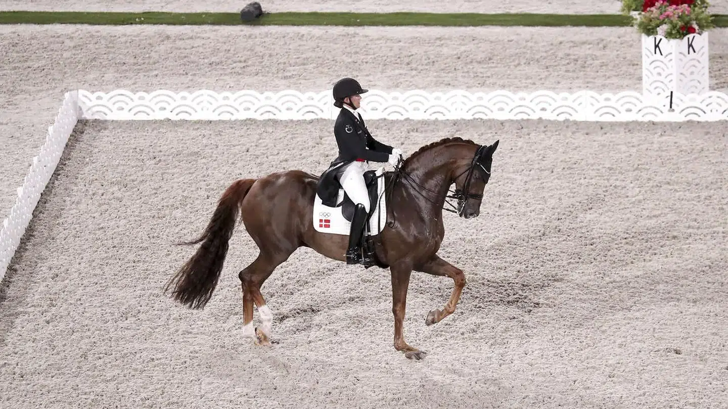 Cathrine Dufour og Bohemian blev diskvalificeret ved et stort stævne i starten af maj. Lørdag red de et fantastisk program i Tokyo, der fik tårerne frem hos landstræneren.
