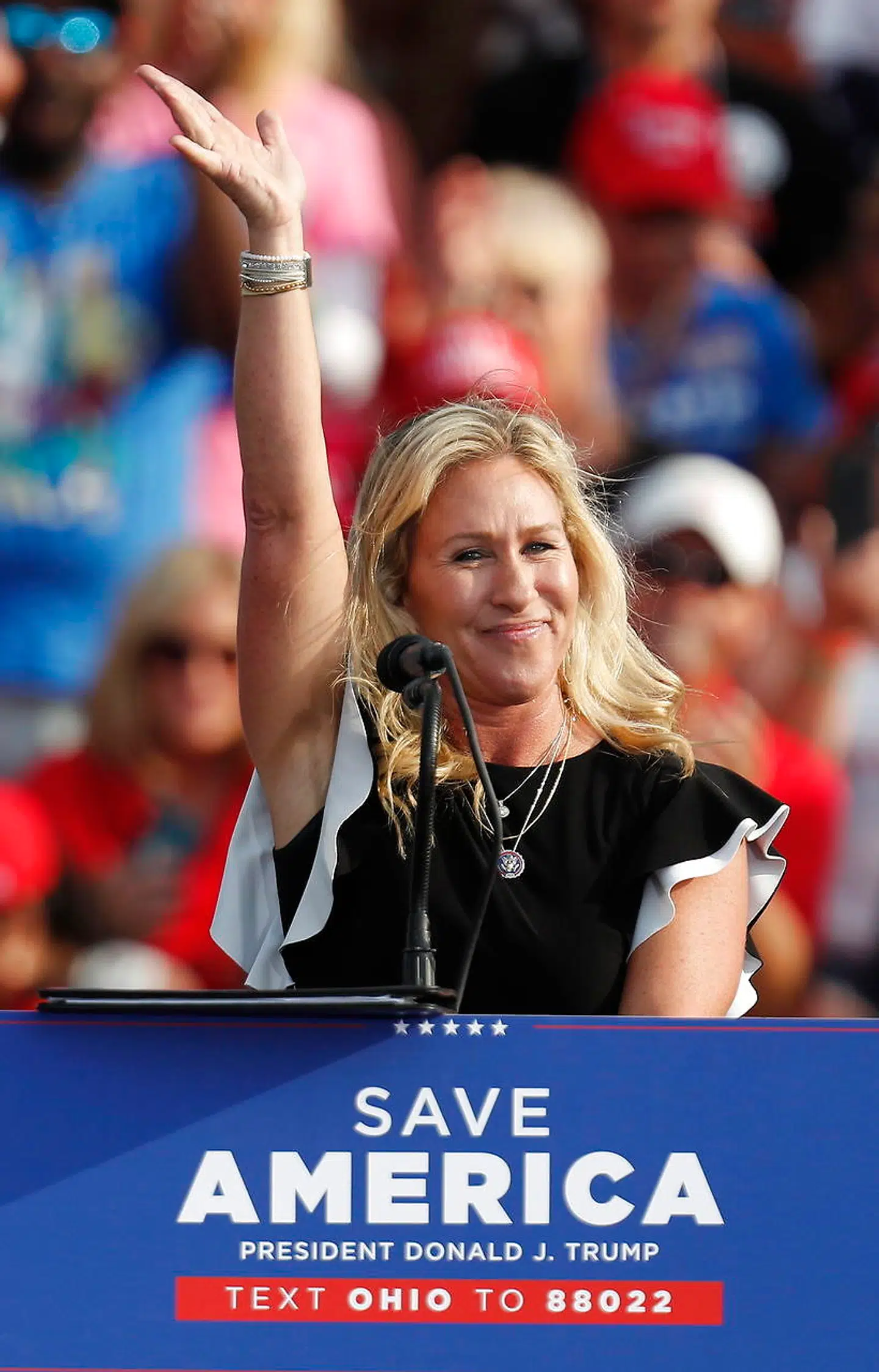 epa09304744 Representative Marjorie Taylor Greene speaks during a rally for former US President Donald Trump (not pictured) at the Lorain County Fairgrounds in Wellington, Ohio, USA, 26 June 2021. The rally is Trump's first since his supporters' January 6 deadly attack on the US Capitol, and marks the beginning of his campaign against 10 House Republicans, including Ohio Representative Anthony Gonzalez, who voted to impeach Trump following the Capitol events. EPA/DAVID MAXWELL