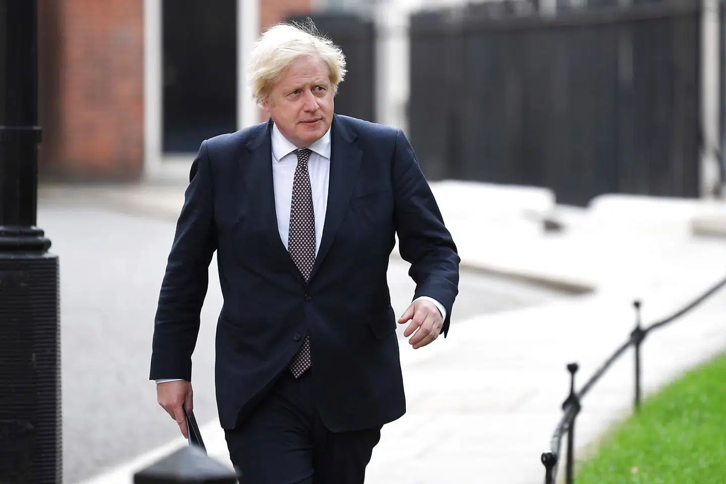 British Prime Minister Boris Johnson walks to hold a news conference for England's COVID-19 lockdown easing announcement in London, Britain July 5, 2021. Daniel Leal-Olivas/Pool via REUTERS