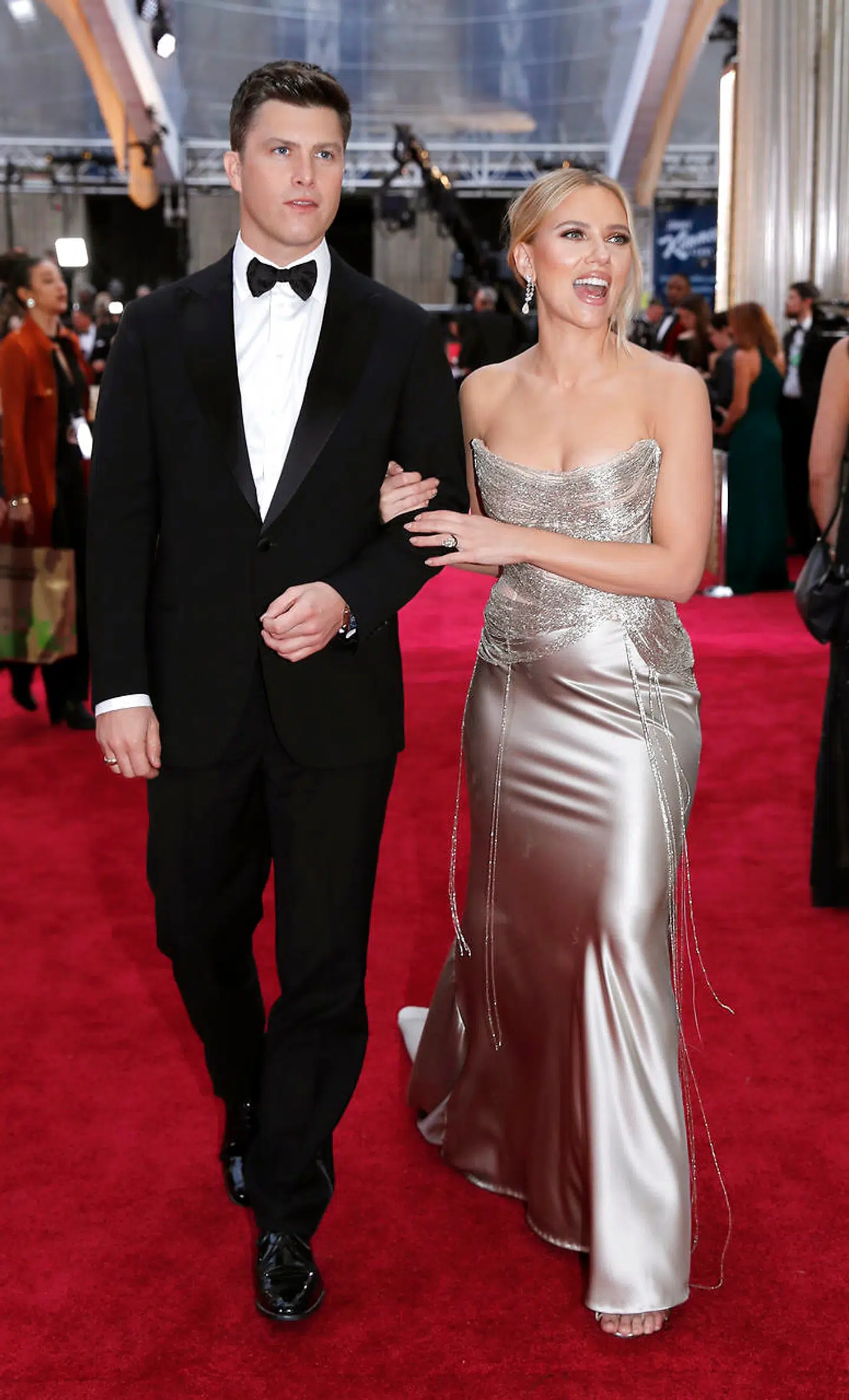 Scarlett Johansson and Colin Jost walk on the red carpet during the Oscars arrivals at the 92nd Academy Awards in Hollywood, Los Angeles, California, U.S., February 9, 2020. REUTERS/Mike Blake