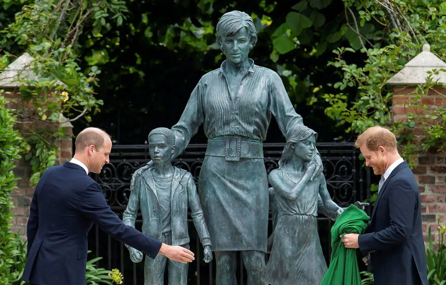 Britain's Prince William, The Duke of Cambridge, and Prince Harry, Duke of Sussex, react during the unveiling of a statue they commissioned of their mother Diana, Princess of Wales, in the Sunken Garden at Kensington Palace, London, Britain July 1, 2021. Dominic Lipinski/Pool via REUTERS TPX IMAGES OF THE DAY