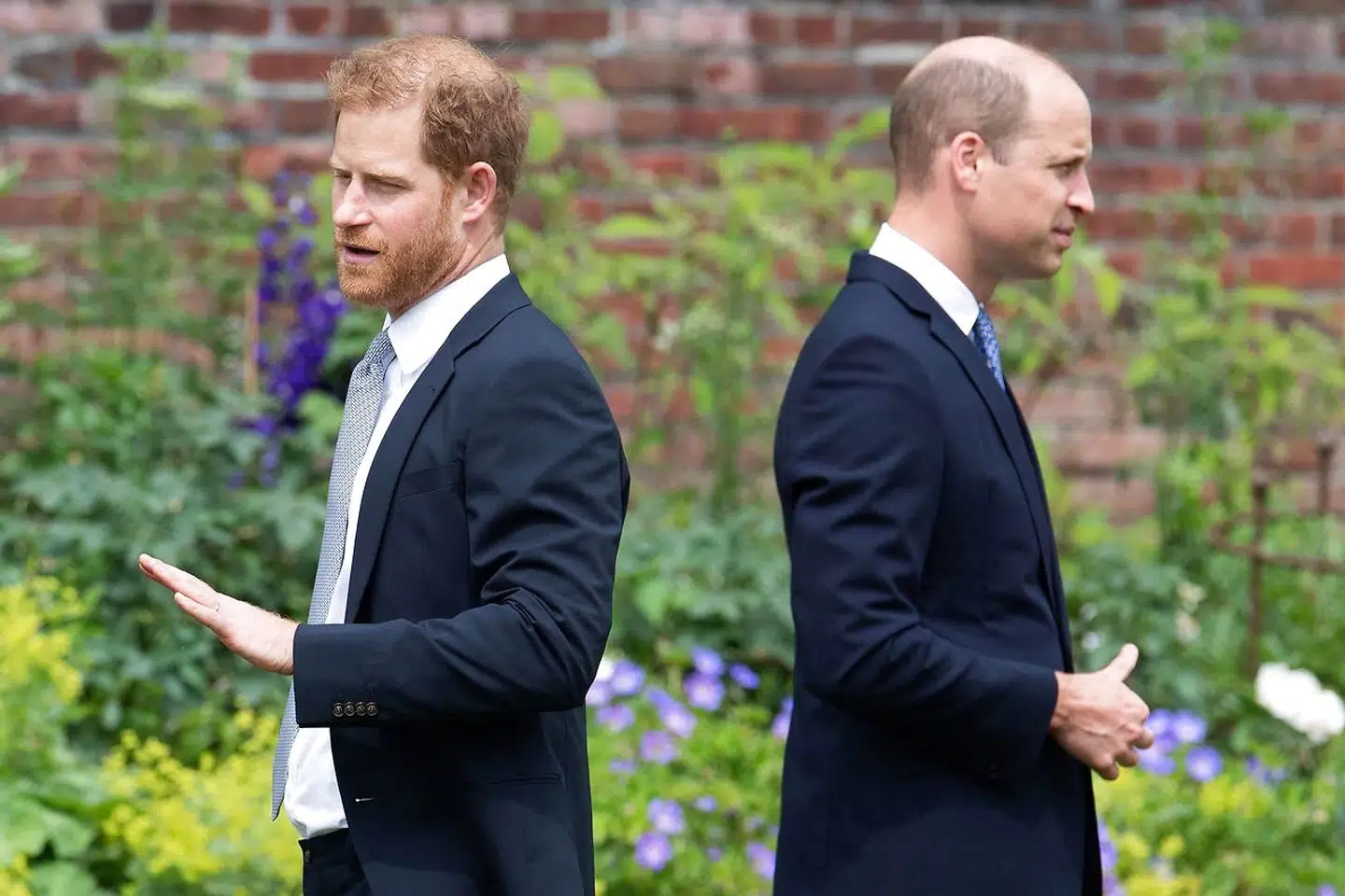 TOPSHOT - Britain's Prince Harry, Duke of Sussex (L) and Britain's Prince William, Duke of Cambridge attend the unveiling of a statue of their mother, Princess Diana at The Sunken Garden in Kensington Palace, London on July 1, 2021, which would have been her 60th birthday. - Princes William and Harry set aside their differences on Thursday to unveil a new statue of their mother, Princess Diana, on what would have been her 60th birthday. (Photo by Dominic Lipinski / POOL / AFP)