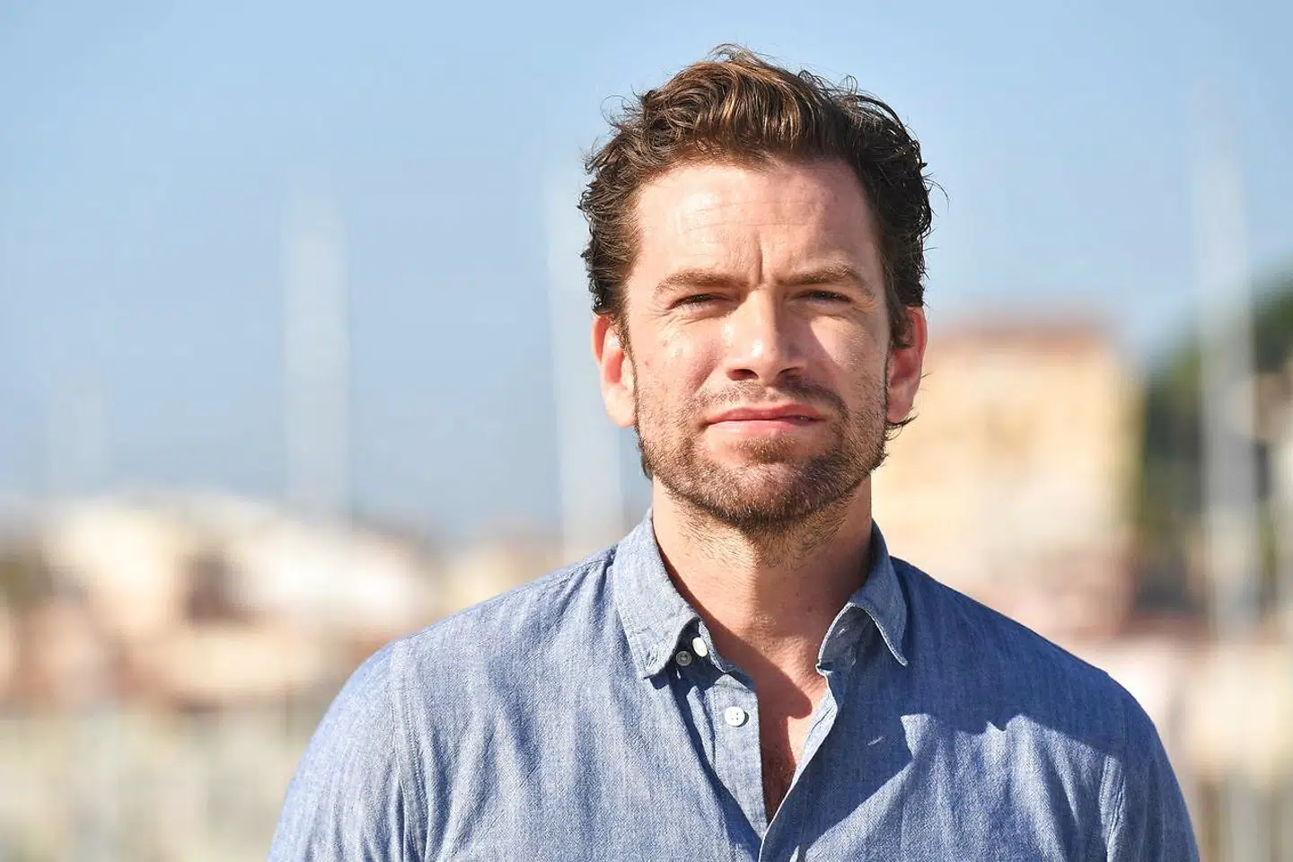 Danisdh actor Nikolaj Lie Kaas poses during the MIPCOM trade show (standing for International Market of Communications Programmes) in Cannes, southern France, on October 16, 2017. / AFP PHOTO / YANN COATSALIOU