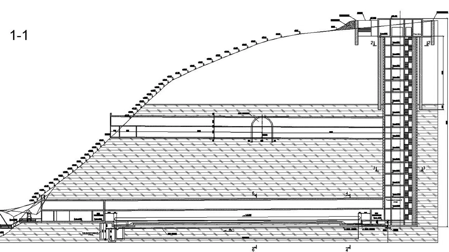 Et tværsnit af bjergsiden viser to tunneler, der er forbundet med en elevator, til højre. Foto: Metro Style