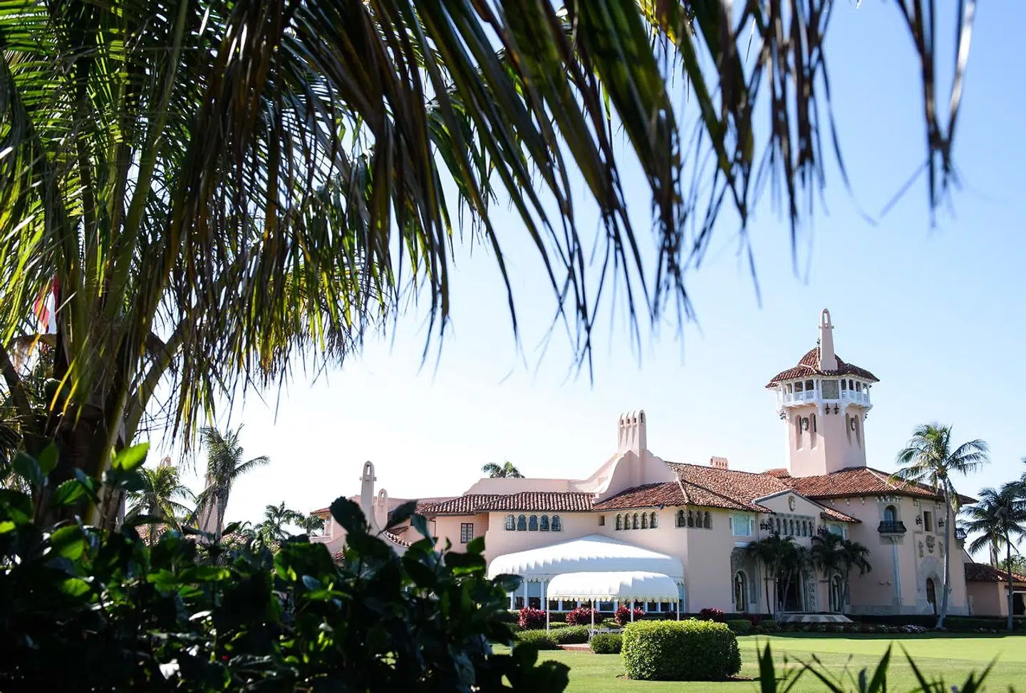 (FILES) In this file photo taken on April 18, 2018 shows US President Donald Trump's Mar-a-Lago resort in Palm Beach, Florida. - Former president Donald Trump's Florida resort Mar-a-Lago has been partially closed after some members of staff tested positive for the coronavirus, US media reported on March 19, 2021. (Photo by MANDEL NGAN / AFP)