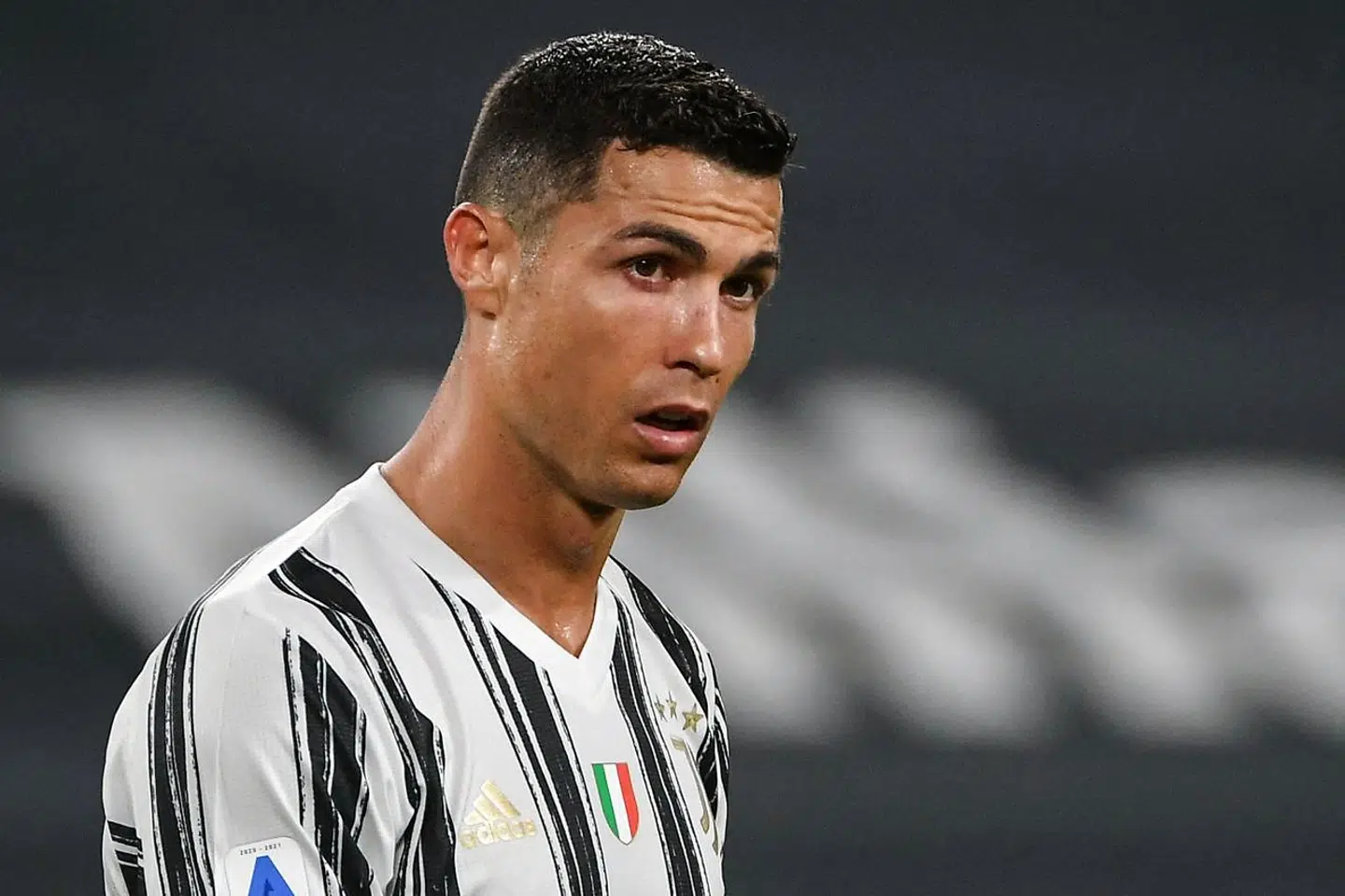 Juventus' Portuguese forward Cristiano Ronaldo reatcs during the Italian Serie A football match Juventus vs AC Milan on May 09, 2021 at the Juventus stadium in Turin. (Photo by Isabella BONOTTO / AFP)