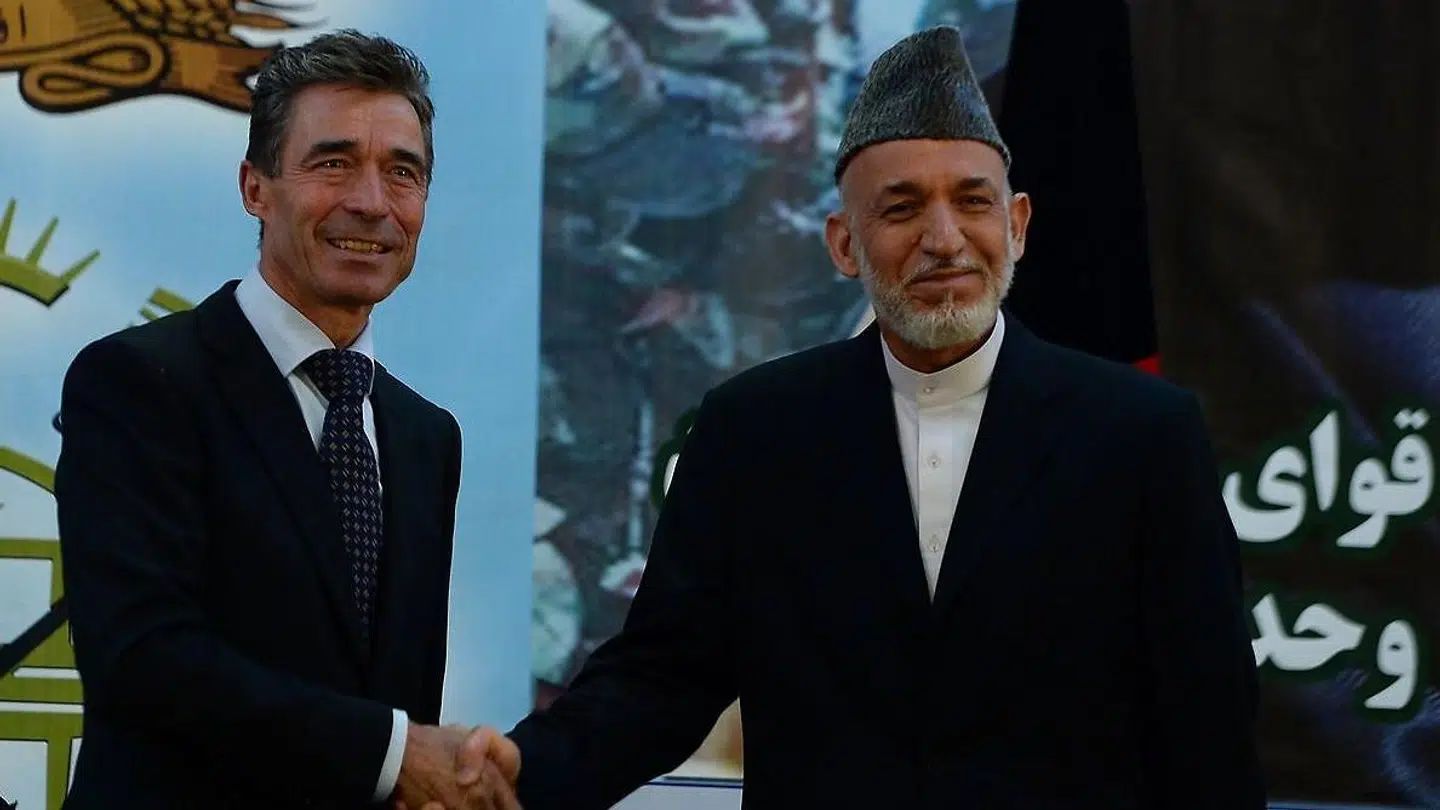 NATO-generalsekrætær Anders Fogh Rasmussen med Afghanistans præsident, Hamid Karzai, i Kabul i 2013.