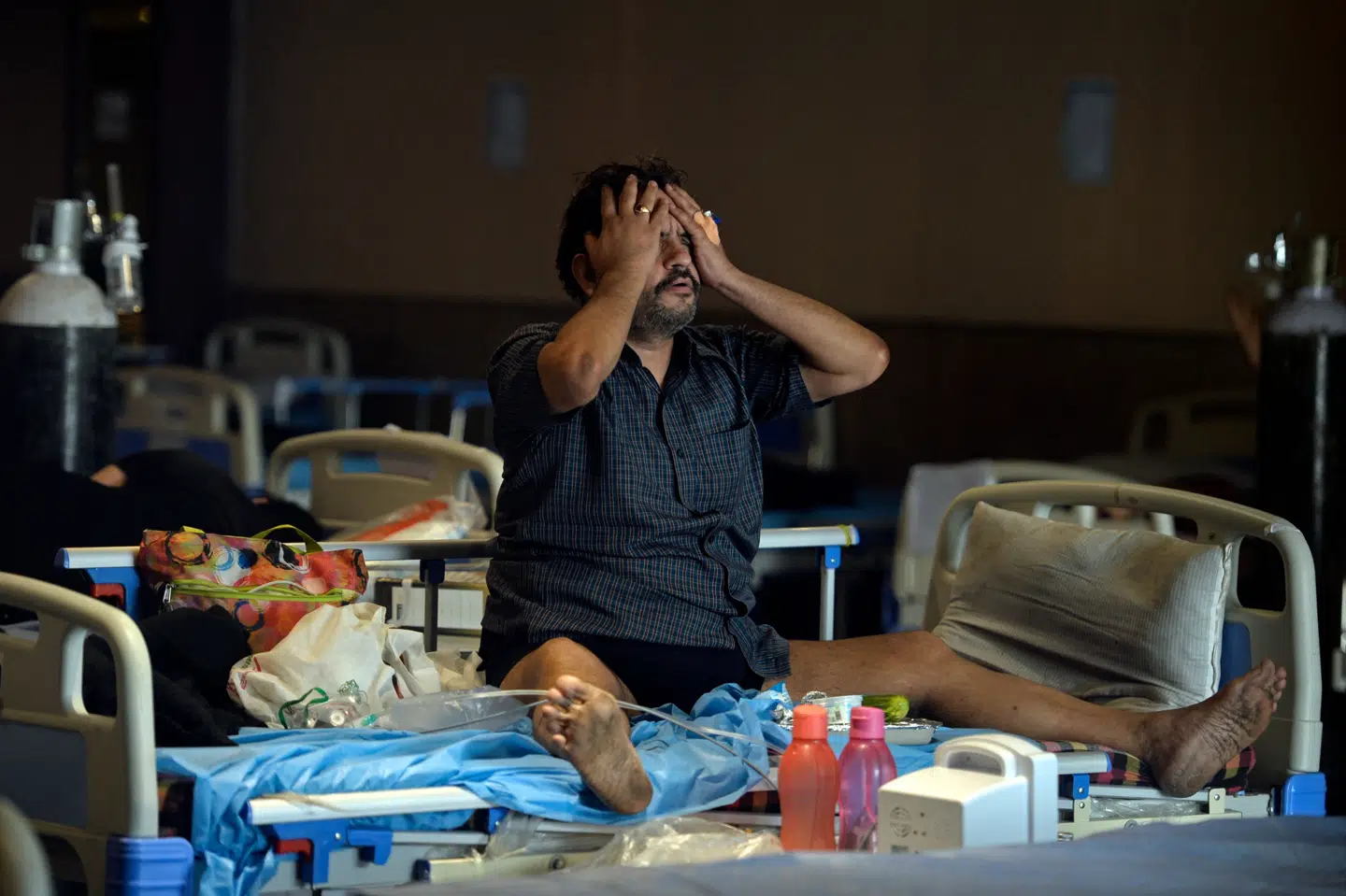 Coronavarianten B1617 er kommet i fokus, efter at Indien i april og maj har oplevet en stor smittestigning og på det seneste har registreret omkring 400.000 smittetilfælde om dagen. Arun Sankar/Ritzau Scanpix