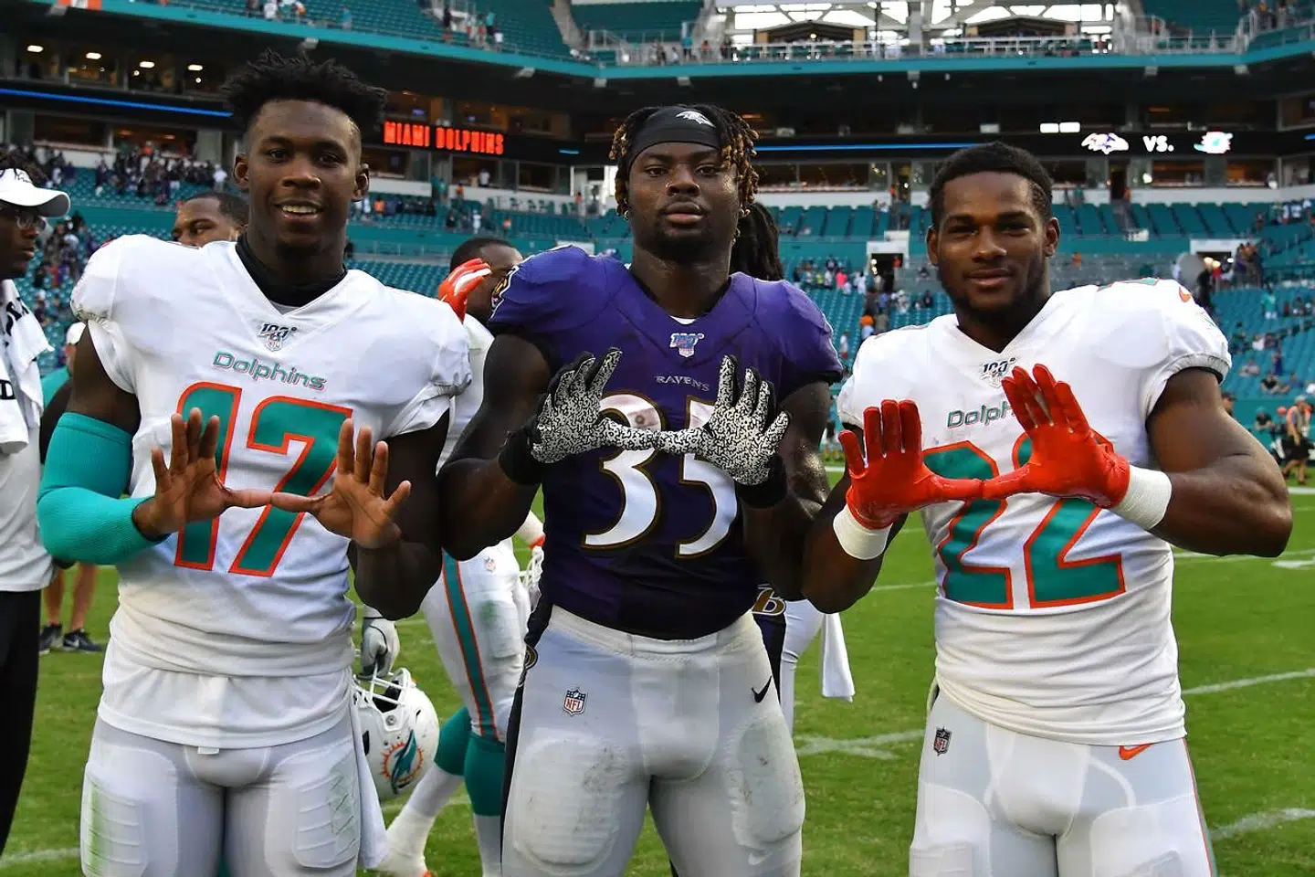 Miami Dolphins spillere. Mark Walton ses længst til højre.