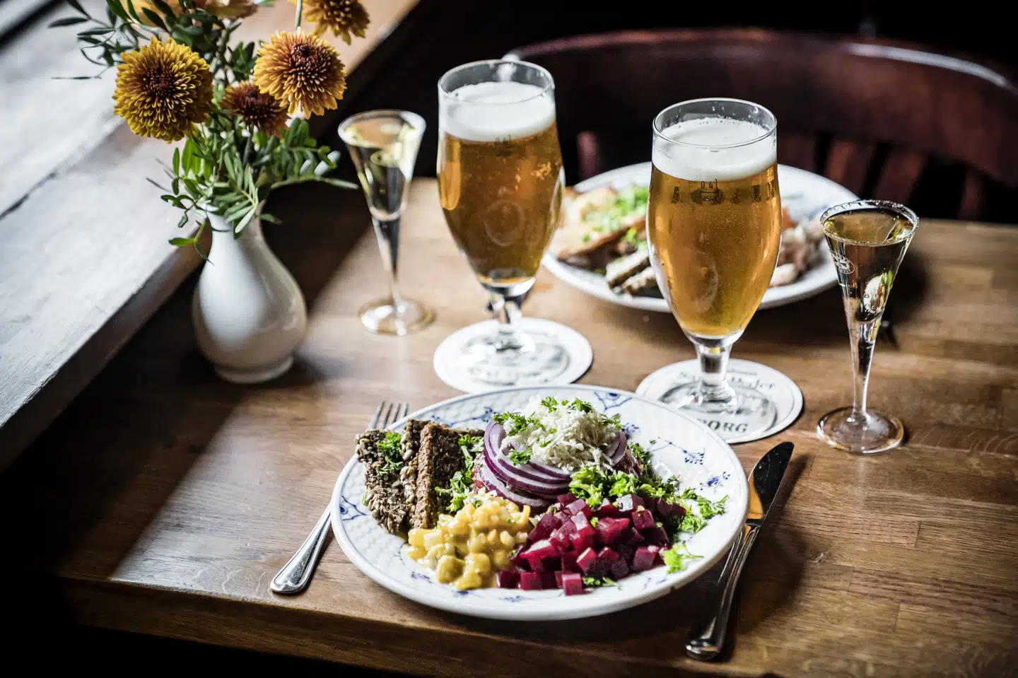 Den omstridte 30-minutters-regel om bordbestilling på barer og restauranter droppes fra torsdag. (Arkivfoto) Thomas Lekfeldt/Ritzau Scanpix