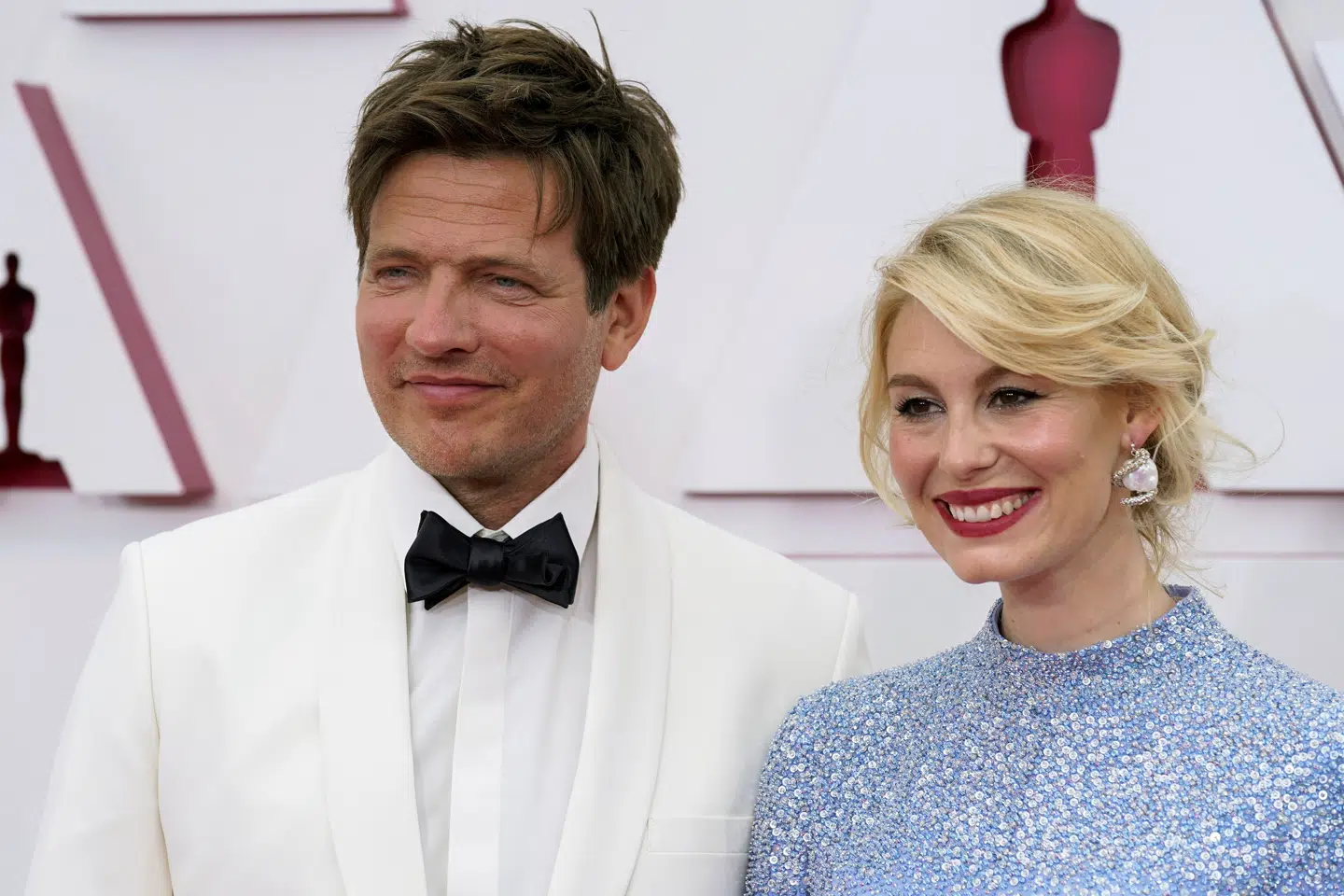 Thomas Vinterberg med sin hustru på den røde løber inden oscaruddelingen, hvor Vinterberg har modtaget prisen for Bedste Internationale Film. Pool/Reuters