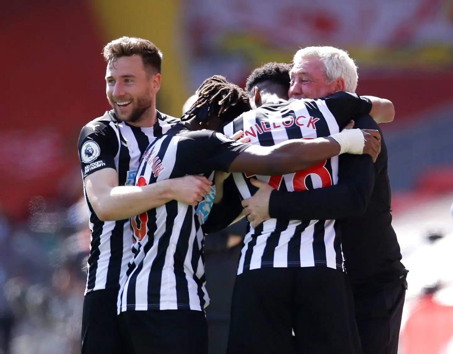 Soccer Football - Premier League - Liverpool v Newcastle United - Anfield, Liverpool, Britain - April 24, 2021 Newcastle United's Joe Willock celebrates scoring their first goal with manager Steve Bruce, Allan Saint-Maximin and Paul Dummett Pool via REUTERS/David Klein EDITORIAL USE ONLY.No use with unauthorized audio, video, data, fixture lists, club/league logos or 'live' services. Online in-match use limited to 75 images, no video emulation.No use in betting, games or single club /league/player publications. Please contact your account representative for further details.