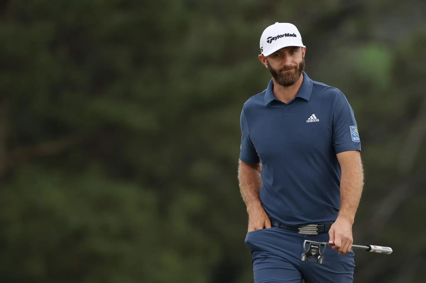 Den amerikanske verdensetter Dustin Johnson (foto) er højst overraskende ude af majorturneringen US Masters. Kevin C. Cox/Ritzau Scanpix