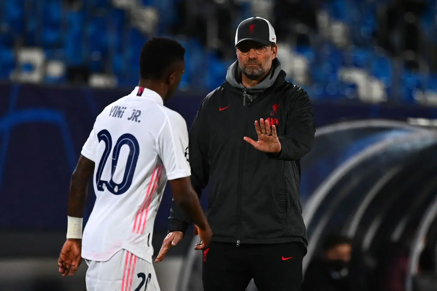 Jürgen Klopp (til højre) så Vinicius Junior (til venstre) score to gange mod et vakkelvornt Liverpool-forsvar. Gabriel Bouys/Ritzau Scanpix