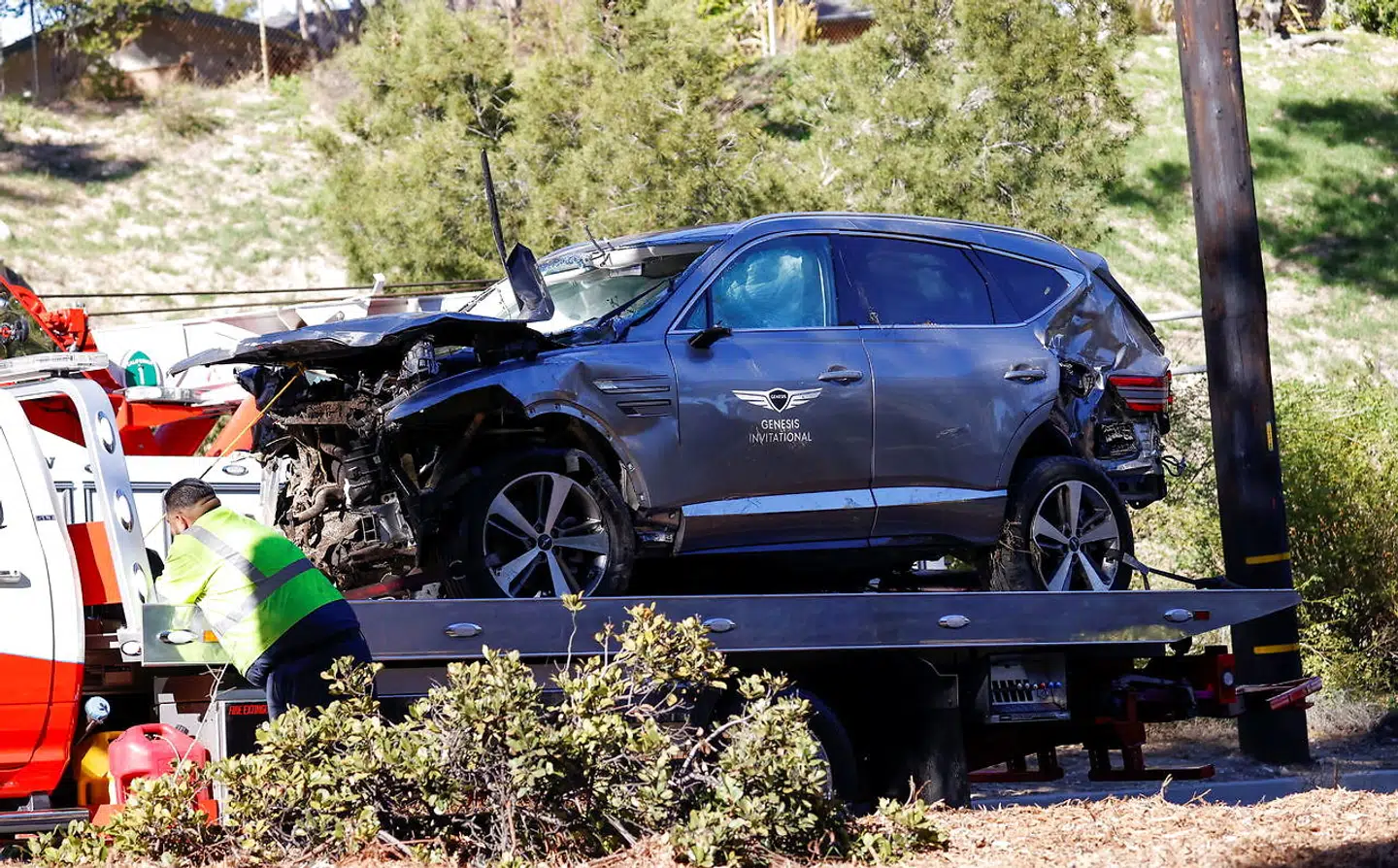 The damaged car of Tiger Woods is towed away after he was involved in a car crash, near Los Angeles, California, U.S., February 23, 2021. REUTERS/Mario Anzuoni