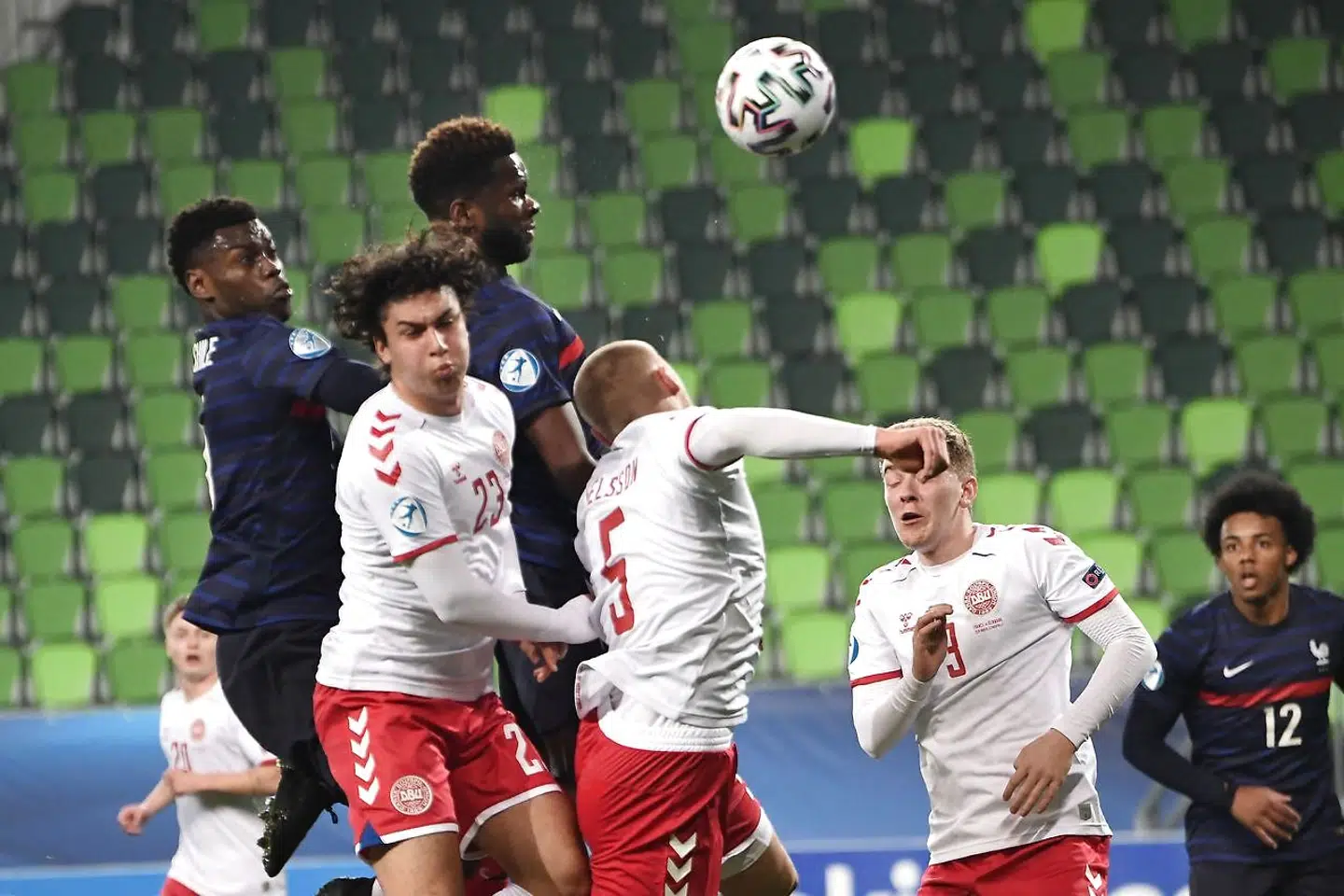 France's defender Benoit Badiashile (L-R), Denmark's forward Wahidullah Faghir, France's defender Faitout Maouassa, Denmark's defender Victor Nelsson, Denmark's defender Andreas Poulsen and France's defender Jules Koundé vie for the ball during the UEFA Under21 Championship group stage football match France v Denmark in Szombathely on March 25, 2021. (Photo by ATTILA KISBENEDEK / AFP)