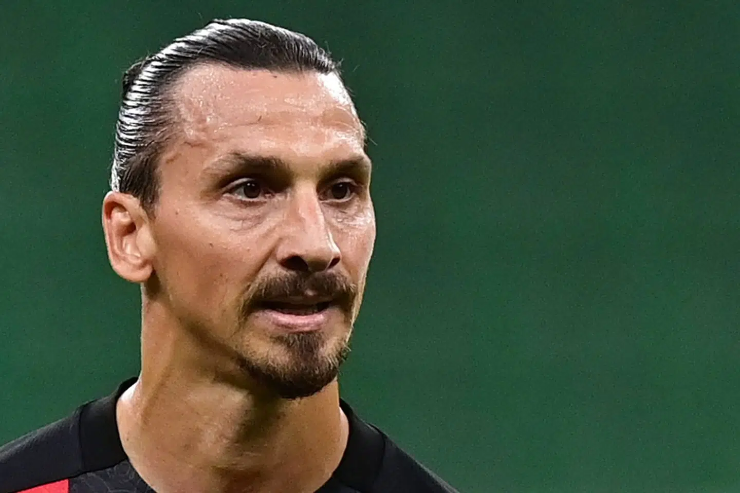 (FILES) In this file photo taken on September 21, 2020 AC Milan's Swedish forward Zlatan Ibrahimovic looks on during the Italian Serie A football match AC Milan vs Bologne at the San Siro stadium in Milan. - AC Milan star Zlatan Ibrahimovic has tested positive for coronavirus, the Italian club disclosed on September 24, 2020. (Photo by MIGUEL MEDINA / AFP)