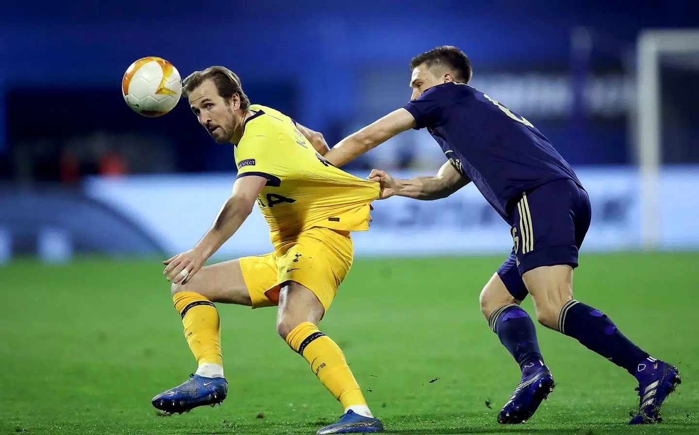 Tottenham's English forward Harry Kane (L) fights for the ball with Dinamo Zagreb's Danish defender Rasmus Lauritsen during the UEFA Europa League round of 16 first leg football match between Dinamo Zagreb and Tottenham Hotspur at the Maksimir Stadium in Zagreb, on March 18, 2021. (Photo by Damir SENCAR / AFP)
