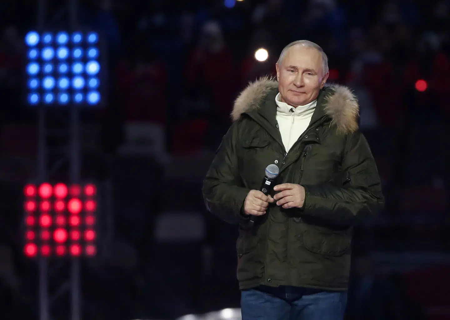 Russian President Vladimir Putin attends a concert marking the seventh anniversary of Russia's annexation of Crimea at Luzhniki Stadium in Moscow, Russia March 18, 2021. Sputnik/Vyacheslav Prokofyev/Pool via REUTERS ATTENTION EDITORS - THIS IMAGE WAS PROVIDED BY A THIRD PARTY.