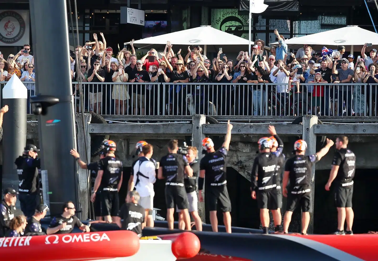 Sailing - 36th America's Cup - Waitemata Harbour, Auckland, New Zealand - March 17, 2021 Fans celebrate with Emirates Team New Zealand after winning the 36th America's Cup REUTERS/Simon Watts