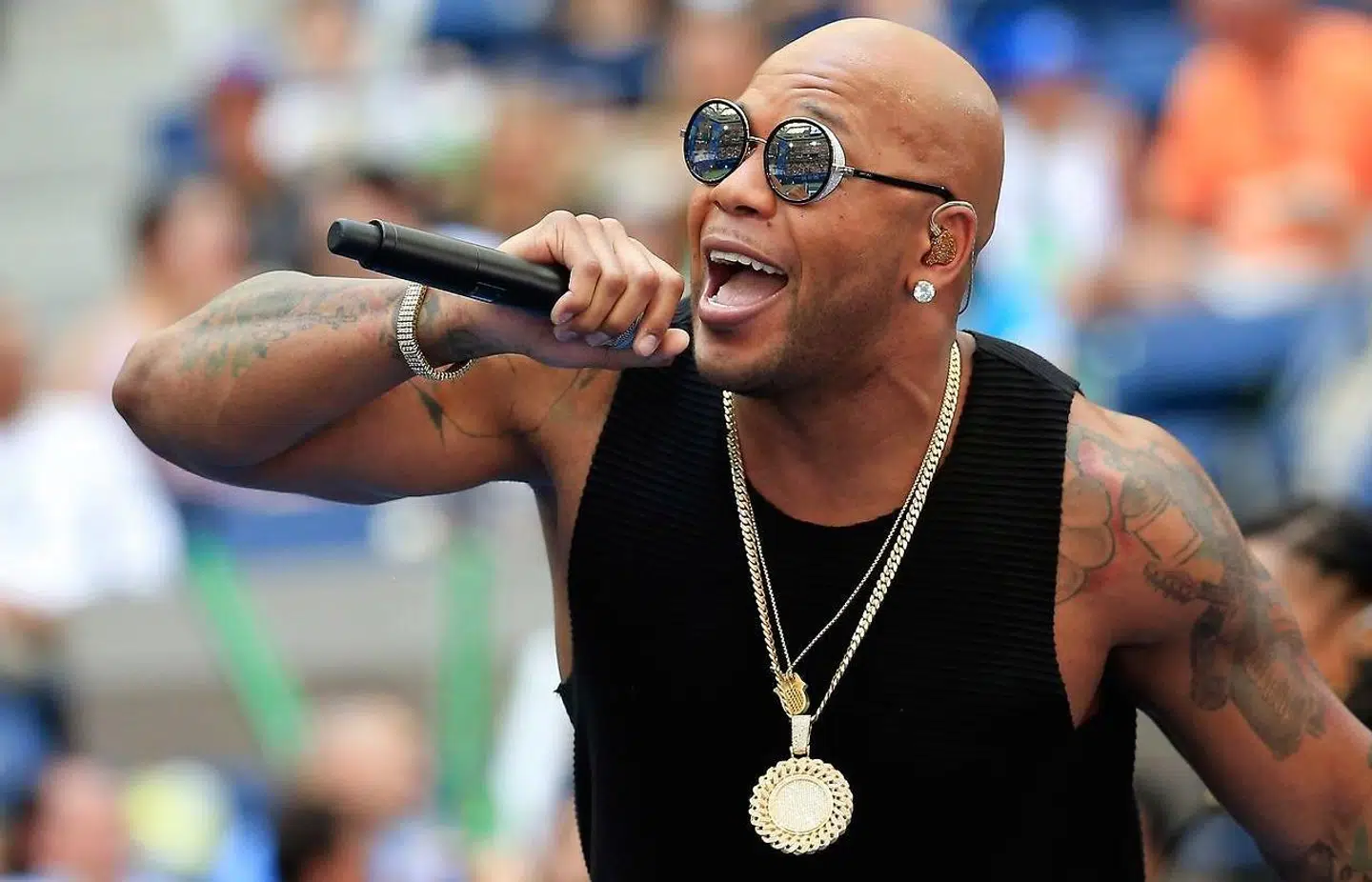 Flo Rida, recording artist, performs during the stadium show during Arthur Ashe Kids' Day prior to the start of the 2016 US Open at the USTA Billie Jean King National Tennis Center on August 27, 2016 in the Queens borough of New York City.