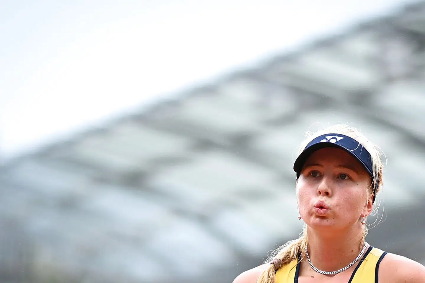 Denmark's Clara Tauson reacts as she plays against Jennifer Brady of the US during their women's singles first round tennis match at the Simonne Mathieu court on Day 3 of The Roland Garros 2020 French Open tennis tournament in Paris on September 29, 2020. (Photo by Anne-Christine POUJOULAT / AFP)