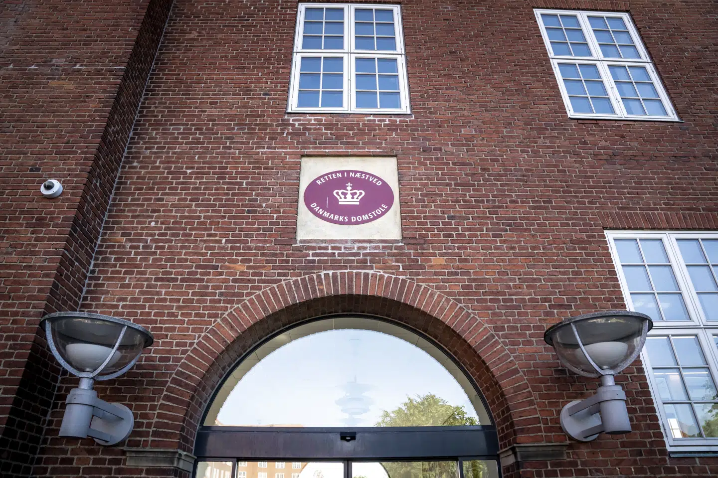 En 20-årig mand er i Retten i Næstved blevet varetægtsfængslet i fire uger i surrogat, sigtet for at have kvalt en 39-årig kvinde. Kvinden blev lørdag fundet død i et buskads i Vordingborg.(Arkivfoto). Mads Claus Rasmussen/Ritzau Scanpix