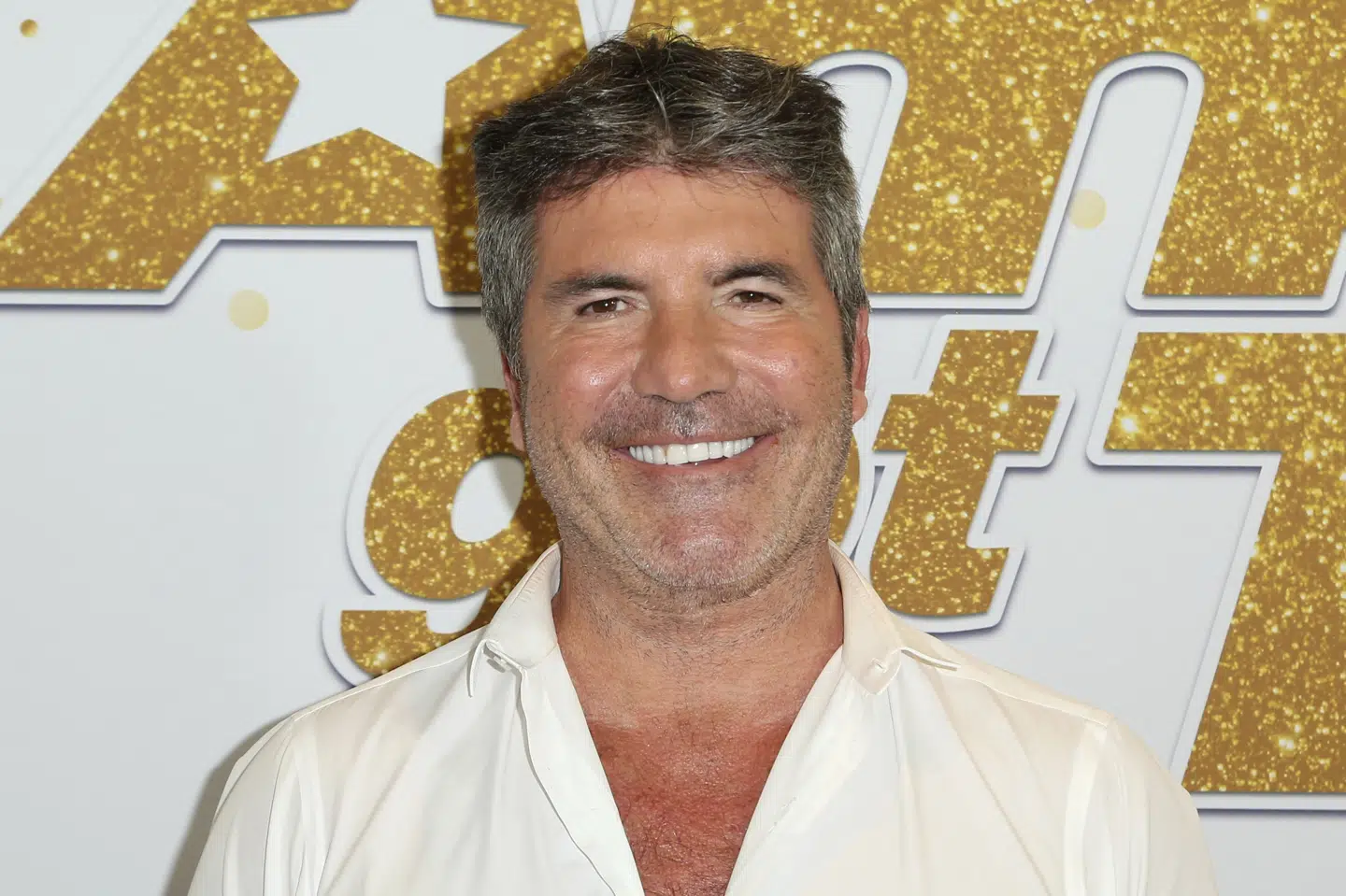Simon Cowell er en af skaberne bag X Factor. Han har siddet som dommer i den britiske udgave siden 2004 med en kort pause fra showet fra 2011 til 2013. Årets danske vinder får en session med den populære herre. (Arkivfoto) Willy Sanjuan/Ritzau Scanpix