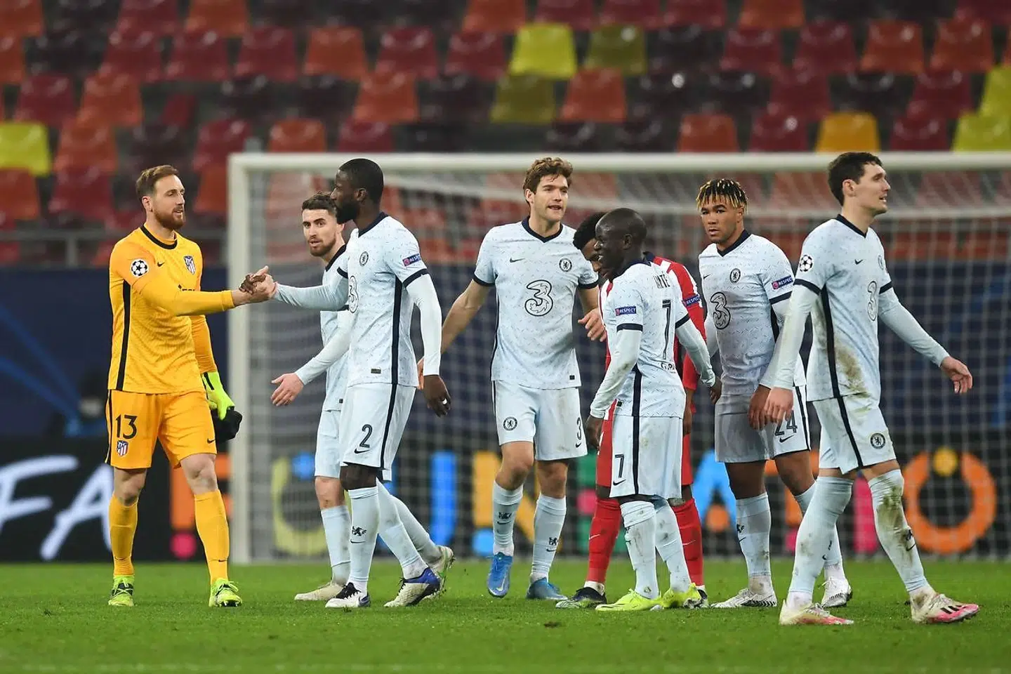 Atletico Madrid's Slovenian goalkeeper Jan Oblak (L) shakes hands with Chelsea's German defender Antonio Rudiger at the end of the UEFA Champions League round of 16 first leg football match between Club Atletico de Madrid and Chelsea at the Arena Nationala stadium in Bucharest on February 23, 2021. (Photo by Daniel MIHAILESCU / AFP)