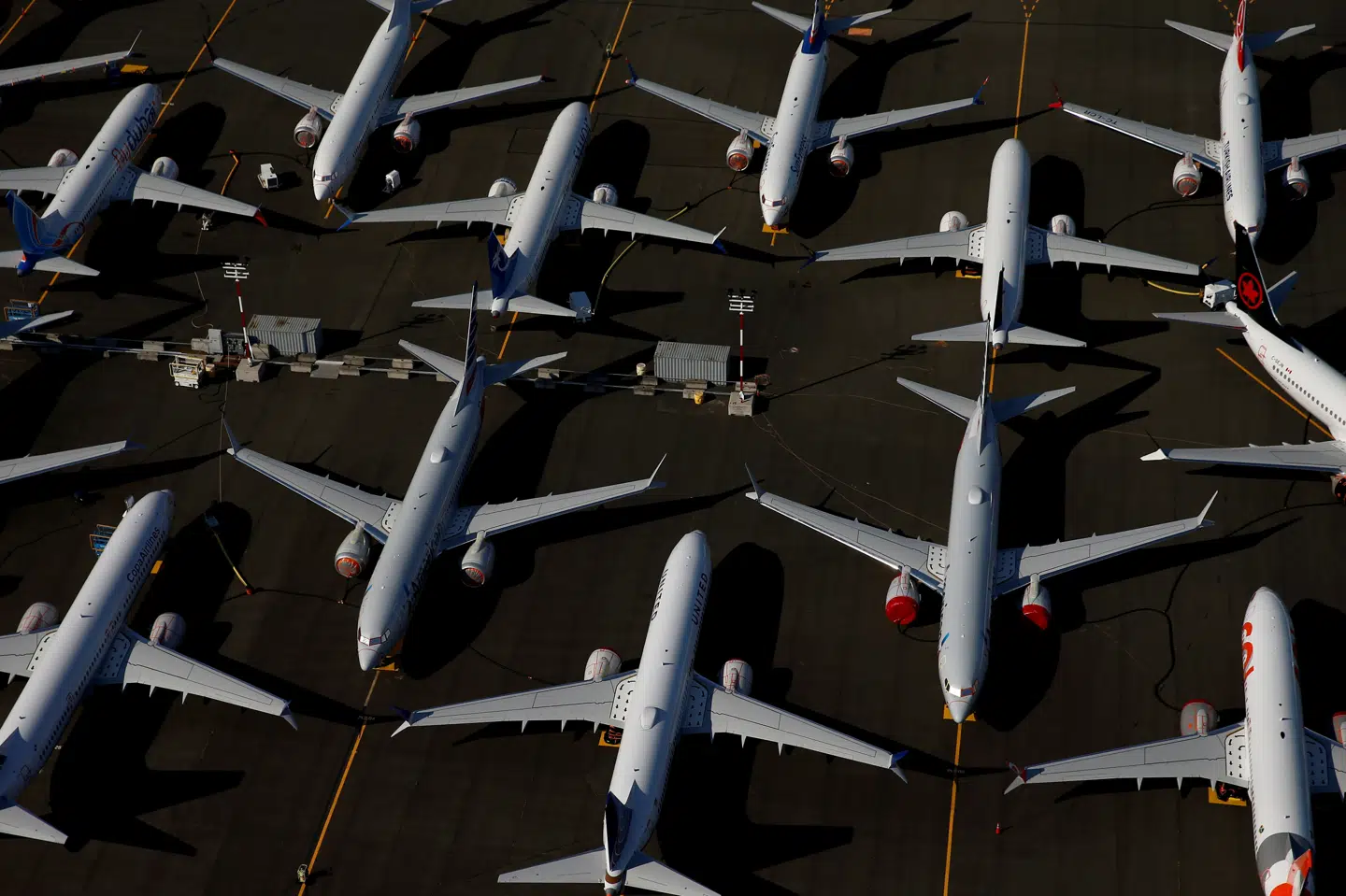 FILE PHOTO: Grounded Boeing 737 MAX aircraft are seen parked at Boeing Field in Seattle Lindsey Wasson/Reuters