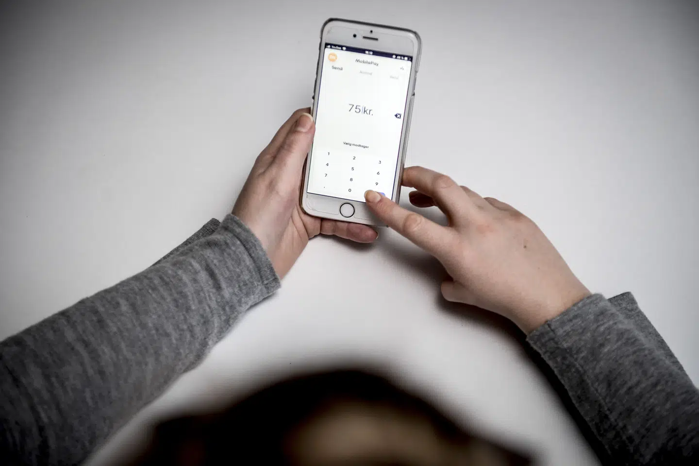 Alle berørte kunder vil få deres penge tilbage, men det er uvist, hvornår pengene er tilbage. Det afhænger blandt andet af, hvilket type betalingskort man har knyttet til sin MobilePay-konto. Mads Claus Rasmussen/Ritzau Scanpix