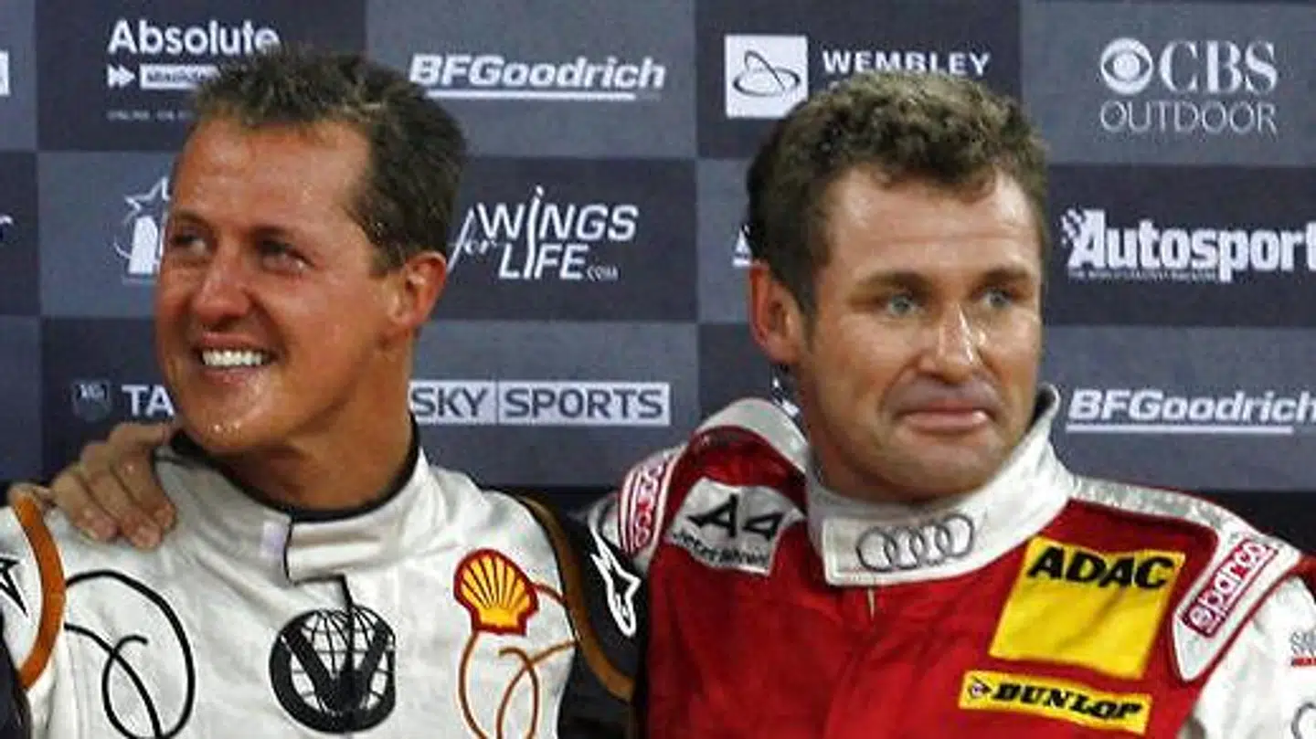 Tom Kristensen og Michael Schumacher kender hinanden særdeles godt. (AFP PHOTO/Ian Kington)