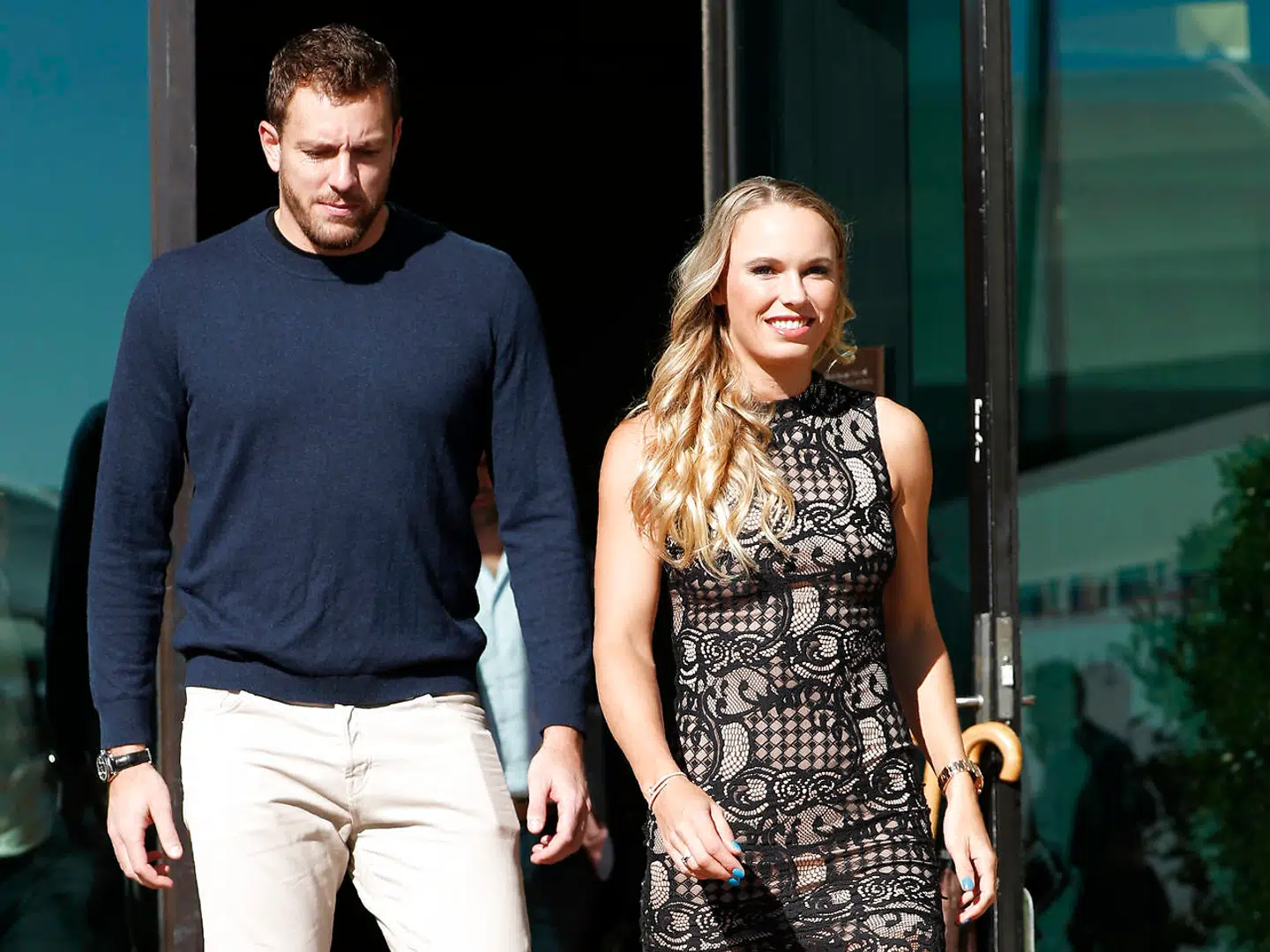 Tennis - Australian Open - Melbourne, Australia, January 14, 2018. Caroline Wozniacki of Denmark and her fiance David Lee arrive for an official players' event for the upcoming Australian Open tennis tournament. REUTERS/Edgar Su