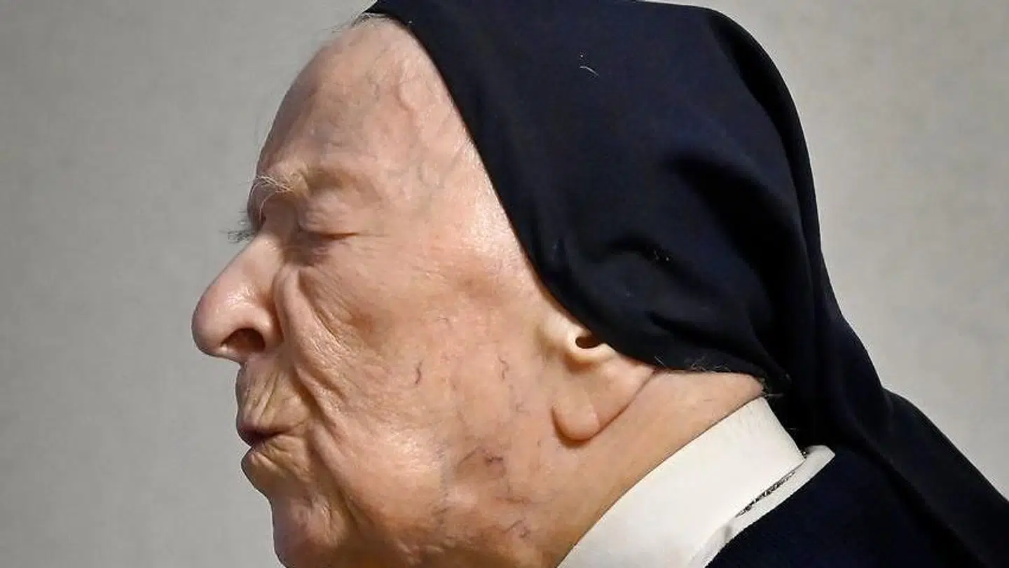 Sister Andre (C), Lucille Randon in the registry of birth, the eldest French citizen, speaks during an event to celebrate her 116th birthday in the EHPAD (Housing Establishment for Dependant Elderly People) in Toulon, southern France, where she has been living since 2009. - Sister Andre was born February 11, 1904. (Photo by GERARD JULIEN / AFP)