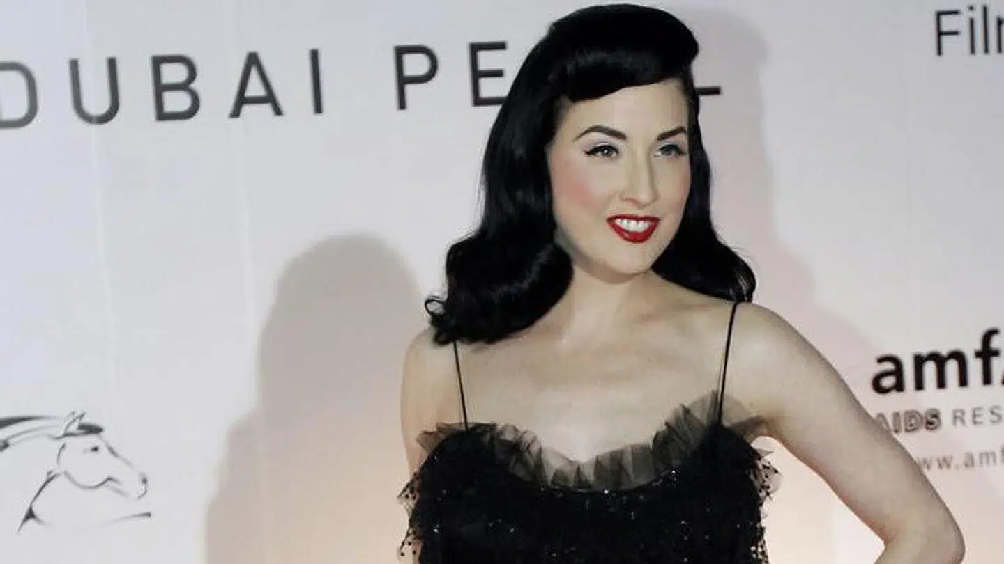 Burlesque artist Dita Von Teese arrives at the Cinema Against AIDS event, held in association with the 4th Dubai International Film Festival, in the Gulf emirate of Dubai, 10 December 10 2007. The benefits of the event, which consist of a gala dinner and an auction, will go to amfAR, the foundation for AIDS research and which US actress Sharon Stone is the global fundraising chairman for the organisation. AFP PHOTO/KARIM SAHIB KARIM SAHIB / AFP