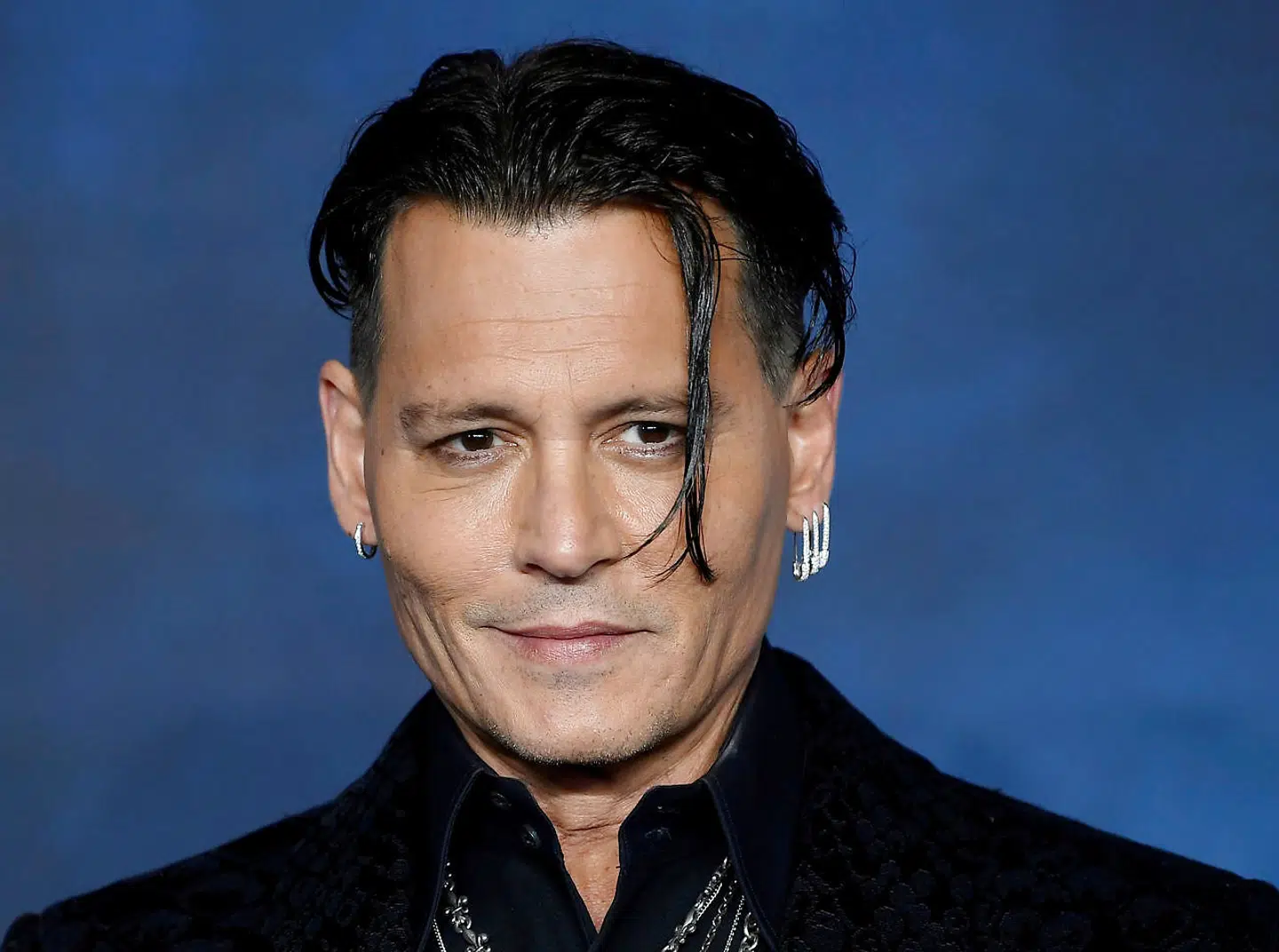 FILE PHOTO: Actor Johnny Depp attends the British premiere of 'Fantastic Beasts: The Crimes of Grindelwald' movie in London, Britain, November 13, 2018. REUTERS/Toby Melville/File Photo