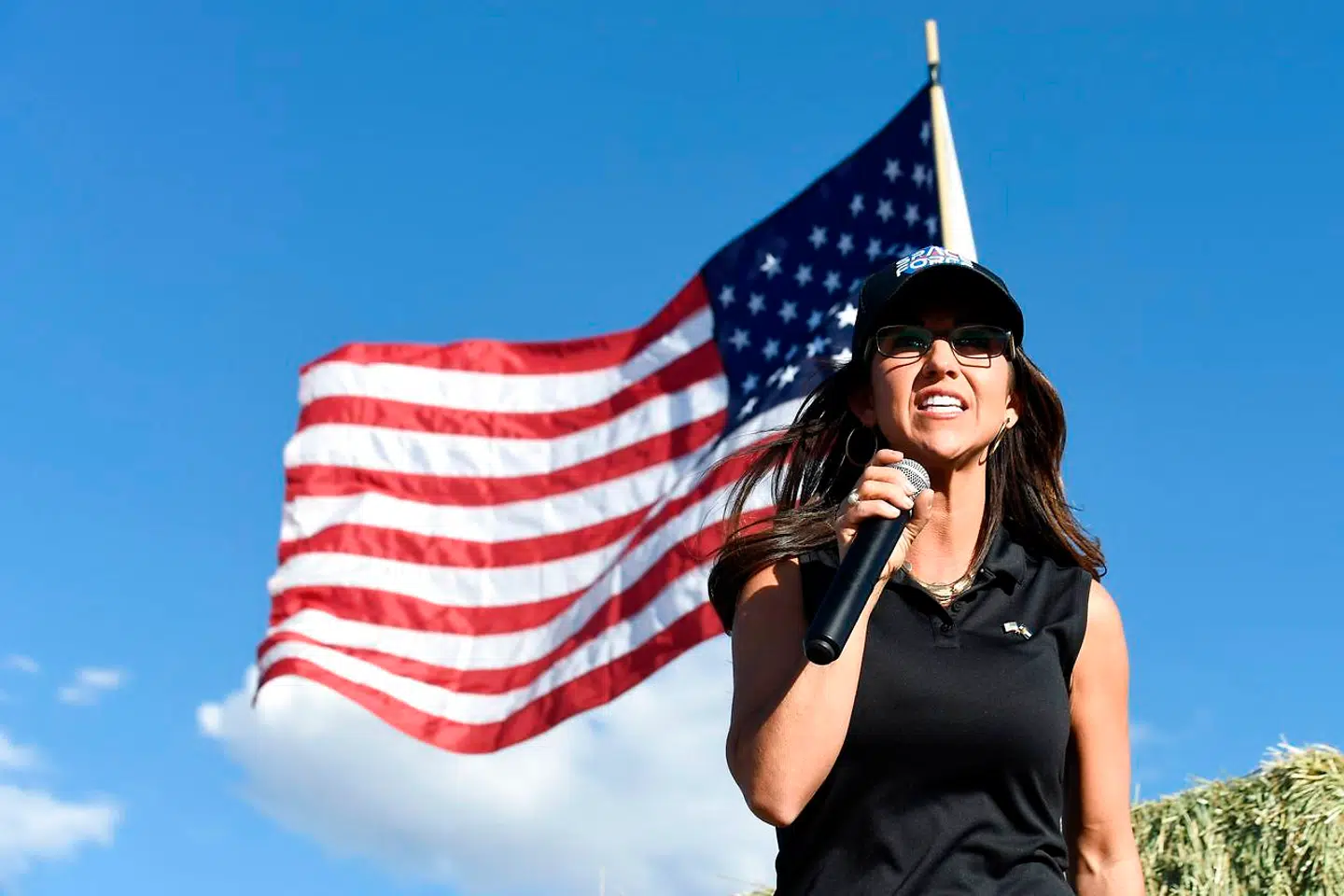 (FILES) In this file photo Lauren Boebert, the Republican candidate for the US House of Representatives seat in Colorado's 3rd Congressional District, addresses supporters during a campaign rally in Colona, Colorado on October 10, 2020. - US lawmakers who refuse to go through metal detectors installed at the House of Representatives after last week's Capitol riot will be fined, Speaker Nancy Pelosi said late January 13. The fine for the first offense will be $5, 000, and $10, 000 for the second, Pelosi said in a statement. Fines will be docked directly from members' salaries. (Photo by Jason Connolly / AFP)