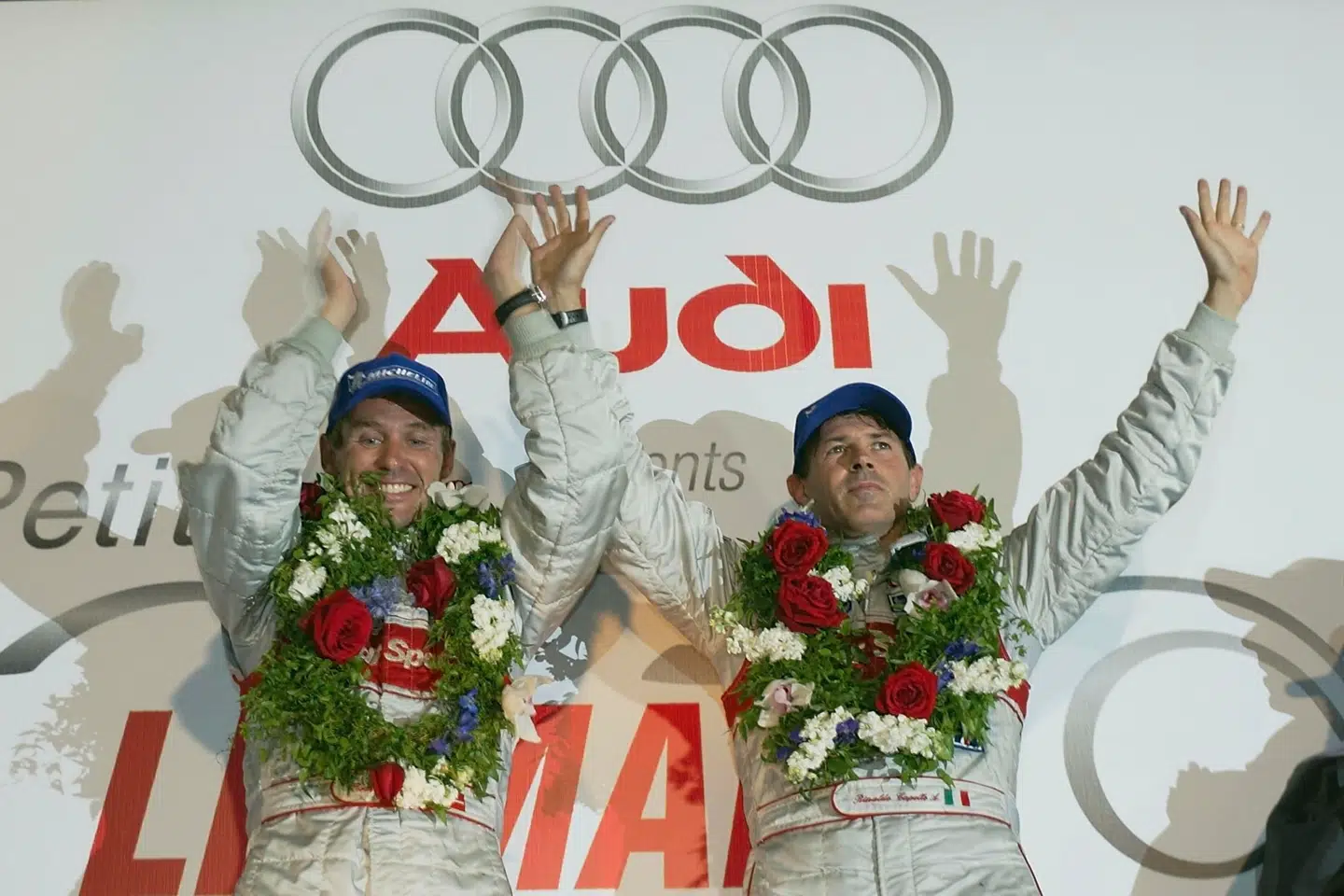 Tom Kristensen (t.v.) vandt ALMS-serien i 2002 for Audi.