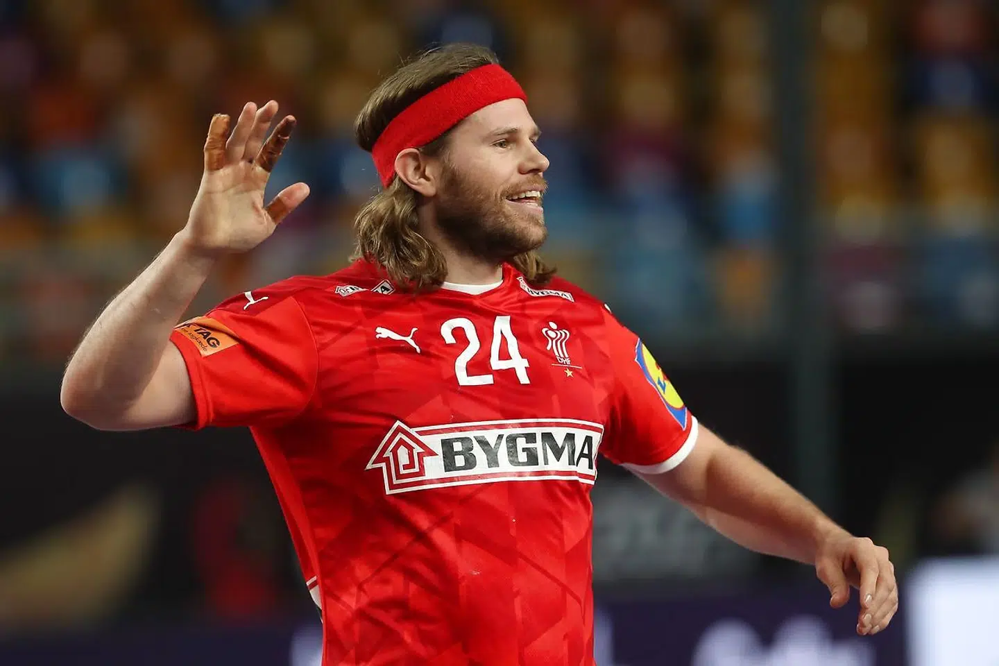 Denmark's left back Mikkel Hansen reacts during the 2021 World Men's Handball Championship between Group II teams Denmark and Qatar at the Cairo Stadium Sports Hall in the Egyptian capital on January 21, 2021. (Photo by MOHAMED ABD EL GHANY / POOL / AFP)