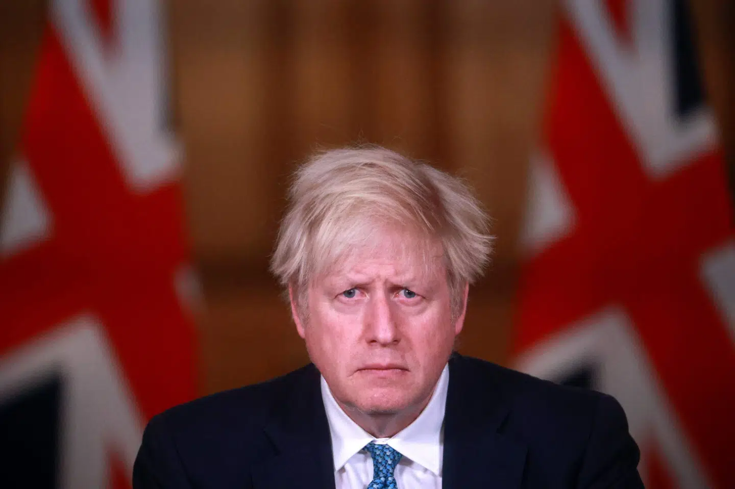 Storbritanniens premierminister, Boris Johnson, siger på et pressemøde tirsdag aften, at over en million personer i England aktuelt er smittet med coronavirus. Det svarer til to procent af befolkningen. Hannah Mckay/Ritzau Scanpix