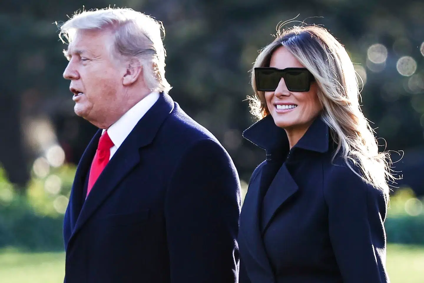 Trump-parret på vej på juleferie på deres resort Mar-a-Lago ved Miami.