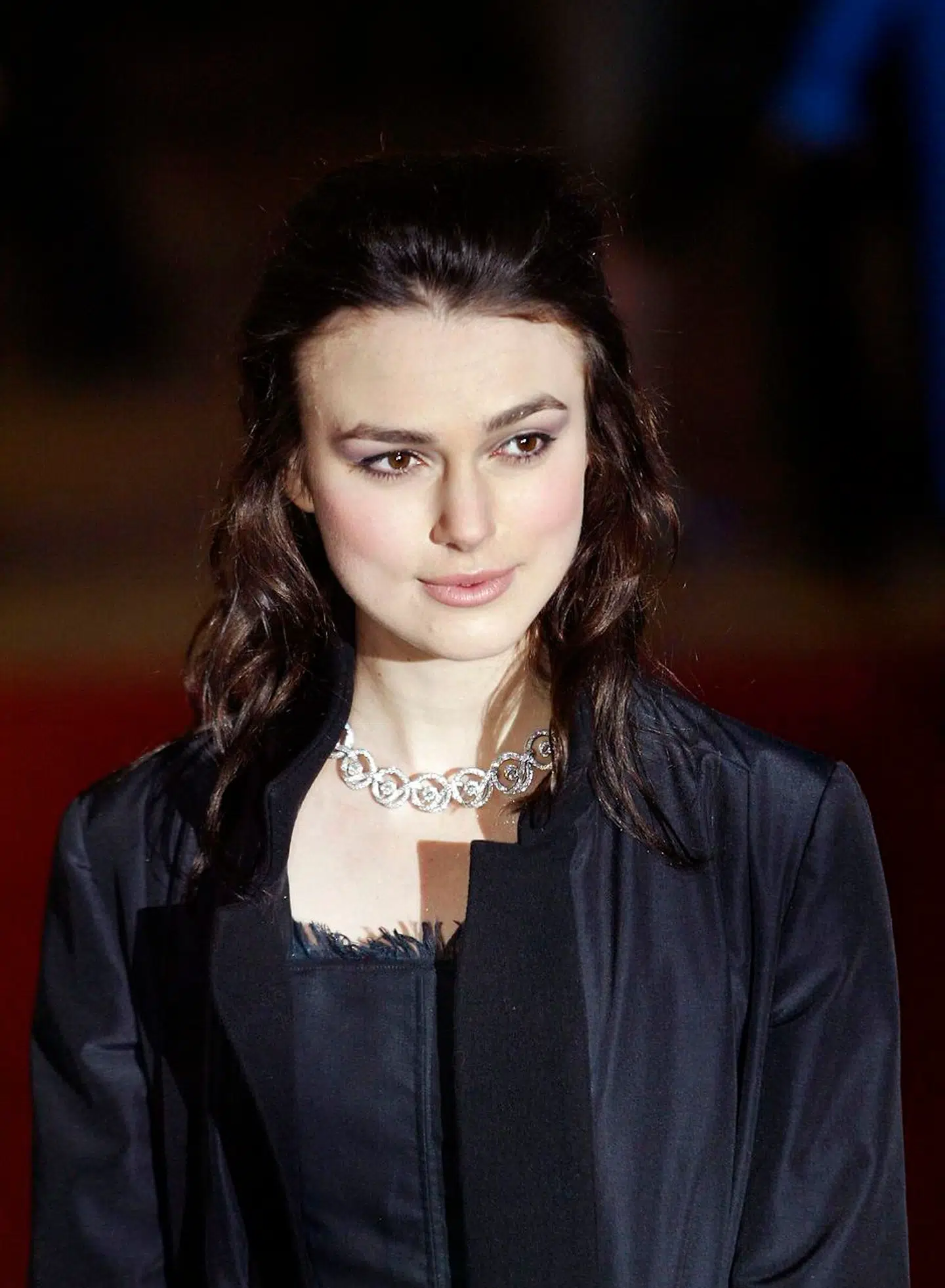 Actress Kiera Knightley arrives for the UK premiere of the film "Love Actually", at the Odeon Cinema, Leicester Square in London, 16 November 2003. "Love Actually" is the latest film from director Richard Curtis, who also made "Four Weddings and a Funeral" and "Notting Hill". AFP PHOTO/ALESSANDRO ABBONIZIO ALESSANDRO ABBONIZIO / AFP