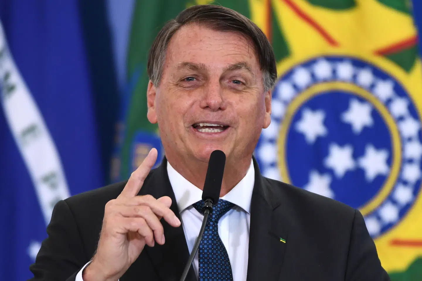 Brasiliens præsident, Jair Bolsonaro, antyder, at nye coronavacciner kan forvandle folk til krokodiller eller give kvinder skæg. (Arkivfoto) Evaristo Sa/Ritzau Scanpix