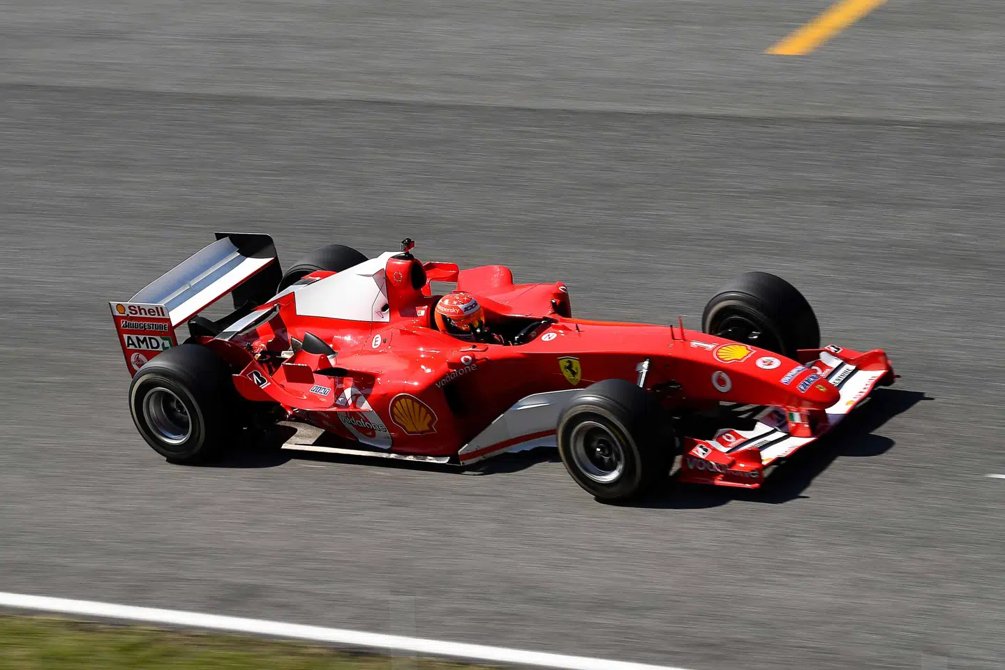 Mick Schumacher i sin far Michaels VM-vinder fra 2004.