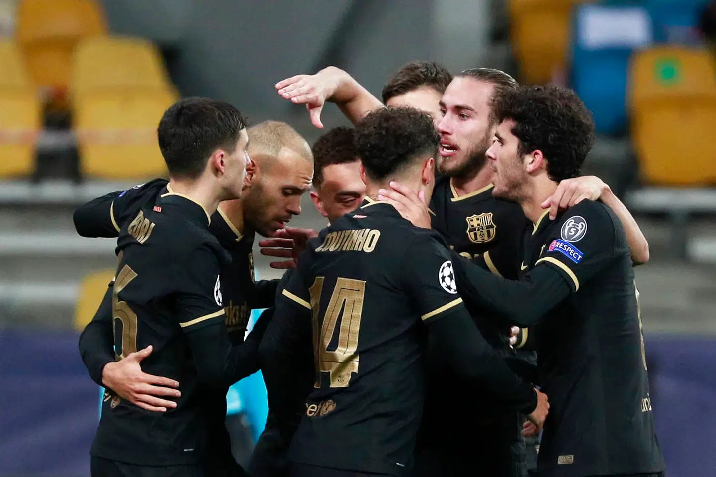 Soccer Football - Champions League - Group G - Dynamo Kyiv v FC Barcelona - NSC Olympiyskiy, Kyiv, Ukraine - November 24, 2020 Barcelona's Sergino Dest celebrates scoring their first goal with teammates REUTERS/Valentyn Ogirenko
