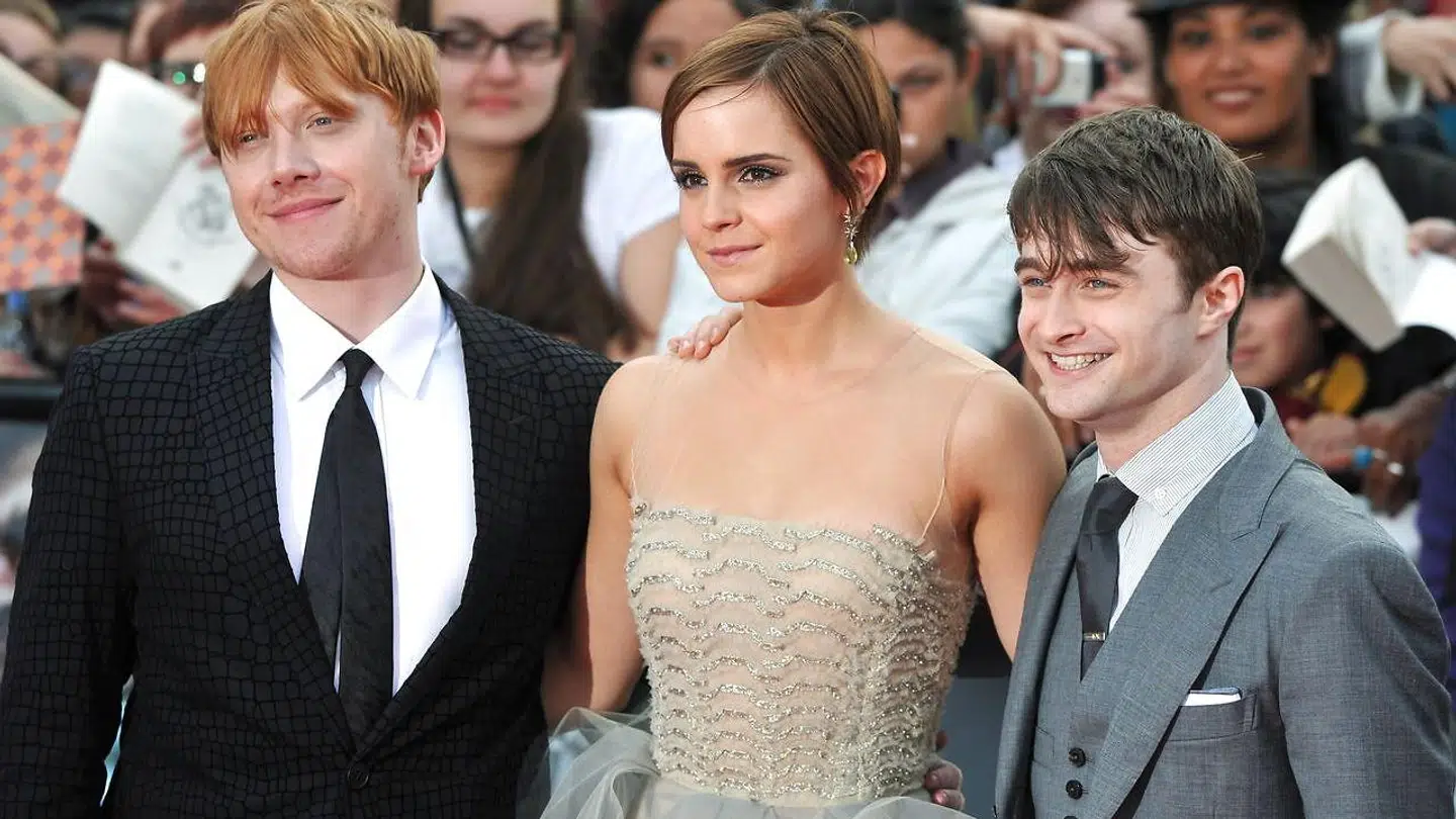 Rupert Grint med sine 'Harry Potter'-medstjerner Emma Watson og Daniel Radcliffe.