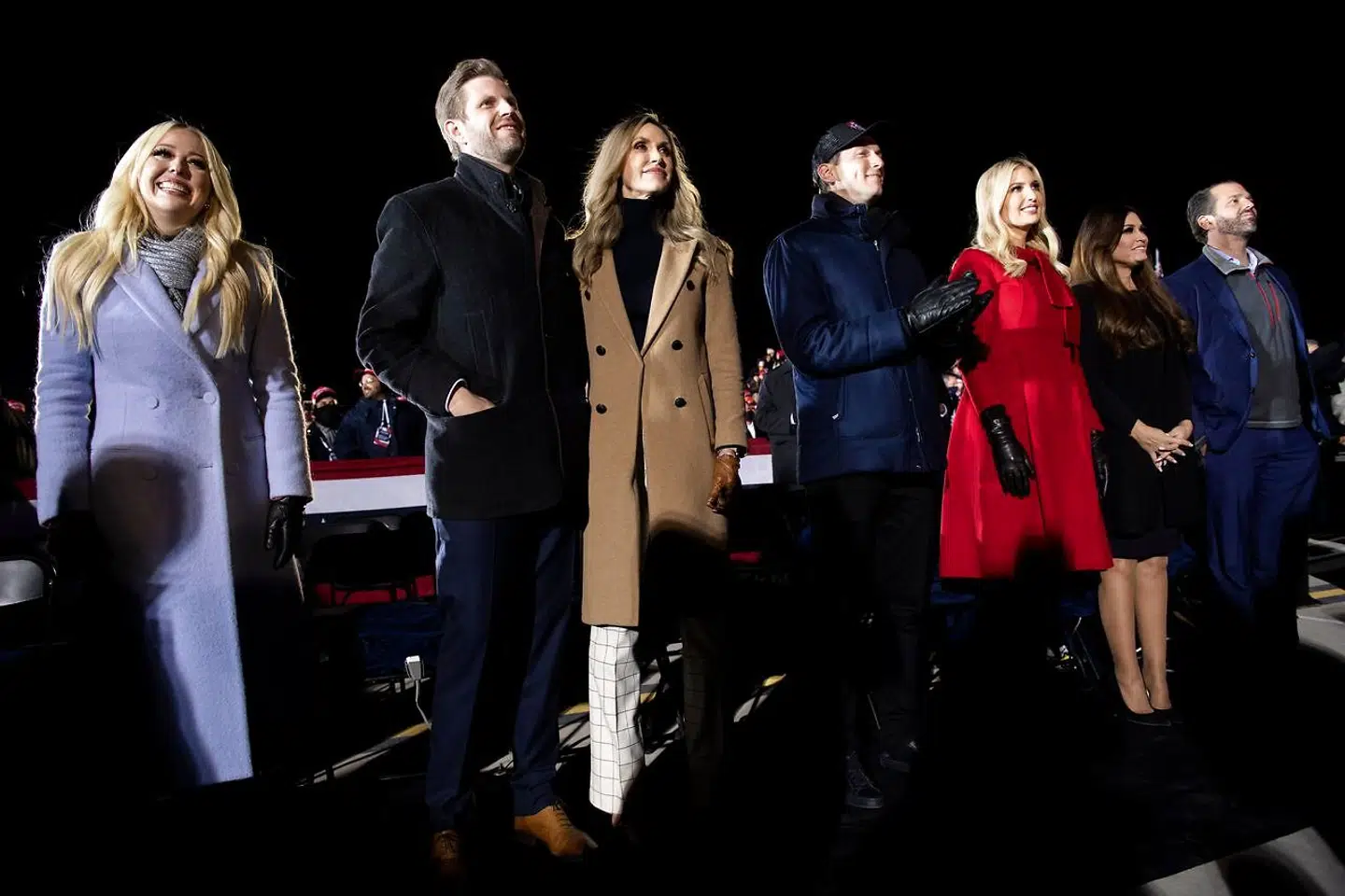 (L-R) Tiffany Trump, Eric Trump, Lara Trump, Senior Advisors Jared Kushner and Ivanka Trump, Kimberly Guilfoyle, and Donald Trump Jr. listen while US President Donald Trump speaks during his final Make America Great Again rally of the 2020 US Presidential campaign at Gerald R. Ford International Airport November 3, 2020, in Grand Rapids, Michigan. (Photo by Brendan Smialowski / AFP)