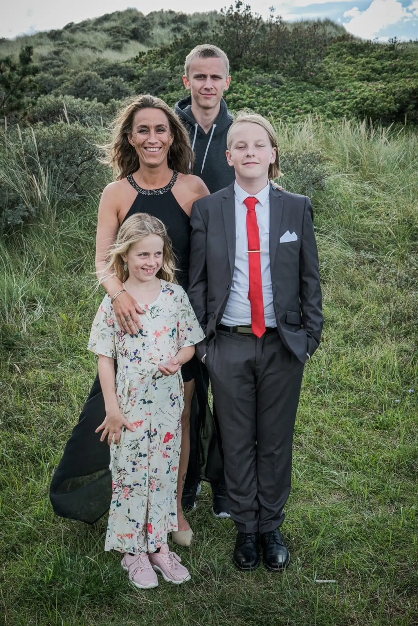 Trine Simmelkjær sammen med børnene Phillip, Sylvester og Seia.