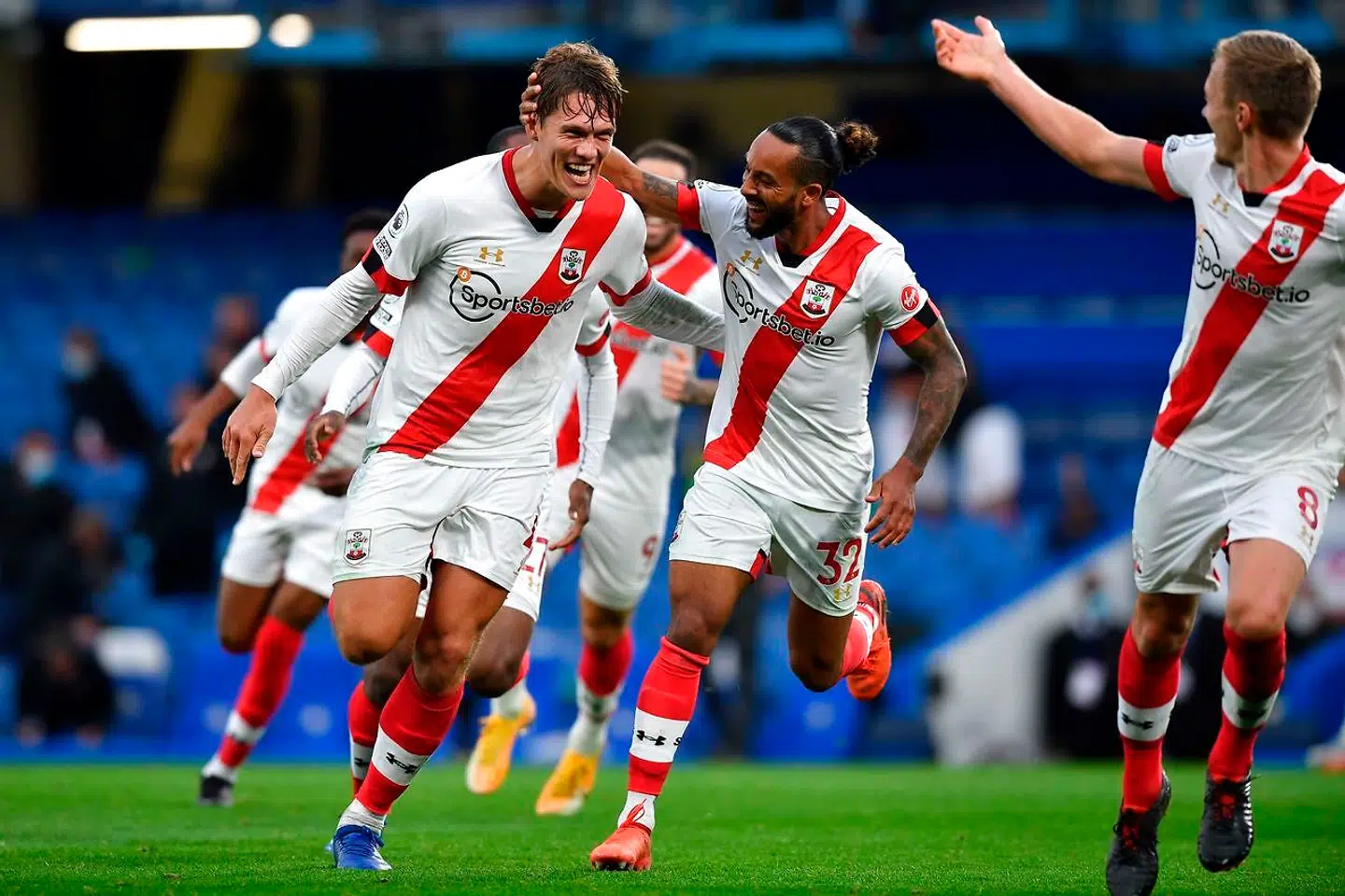 Southampton's Danish defender Jannik Vestergaard (L) celebrates scoring during the English Premier League football match between Chelsea and Southampton at Stamford Bridge in London on October 17, 2020. (Photo by Ben STANSALL / POOL / AFP) / RESTRICTED TO EDITORIAL USE.No use with unauthorized audio, video, data, fixture lists, club/league logos or 'live' services. Online in-match use limited to 120 images. An additional 40 images may be used in extra time.No video emulation. Social media in-match use limited to 120 images. An additional 40 images may be used in extra time.No use in betting publications, games or single club/league/player publications. /