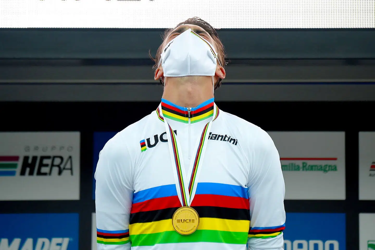 epa08701919 France's Julian Alaphilippe reacts during the award ceremony after winning the men's Elite Road Race over 258.2km at the UCI 2020 Road Cycling World Championships in Imola, Italy, 27 September 2020. EPA/DARIO BELINGHERI